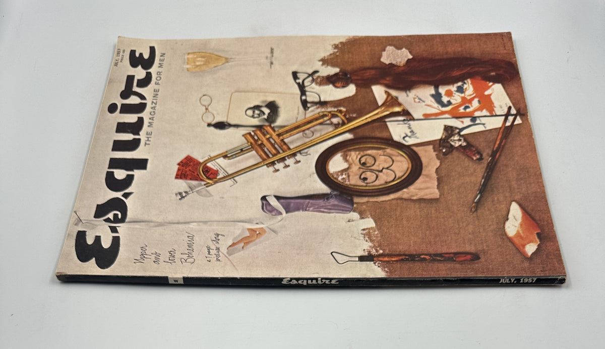 Cover of Esquire Magazine July 1957 featuring artistic elements including a trumpet, an ornate mirror, and artistic tools, highlighting the issue on Aristotle Onassis, genius of Ettore Bugatti, and Alec Waugh.