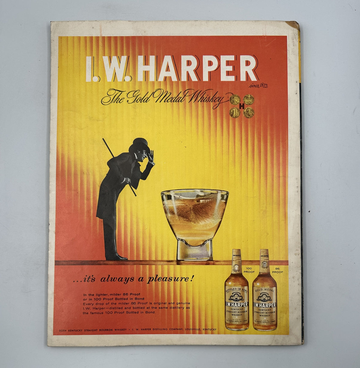 Esquire Magazine October 1957 cover page for I.W. Harper whiskey, featuring an artistic whiskey glass and a silhouette of a gentleman.