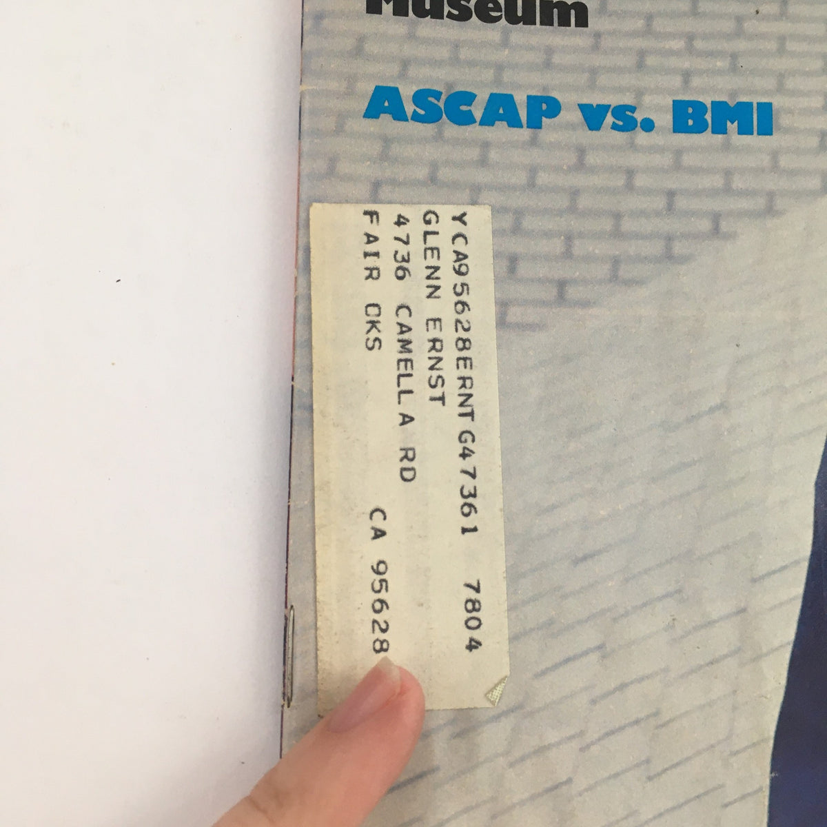 Close-up of the edge of Songwriter Magazine August 1977 showcasing the address label and details about ASCAP vs. BMI. This vintage magazine includes significant content related to songwriting and the Nashville music scene.
