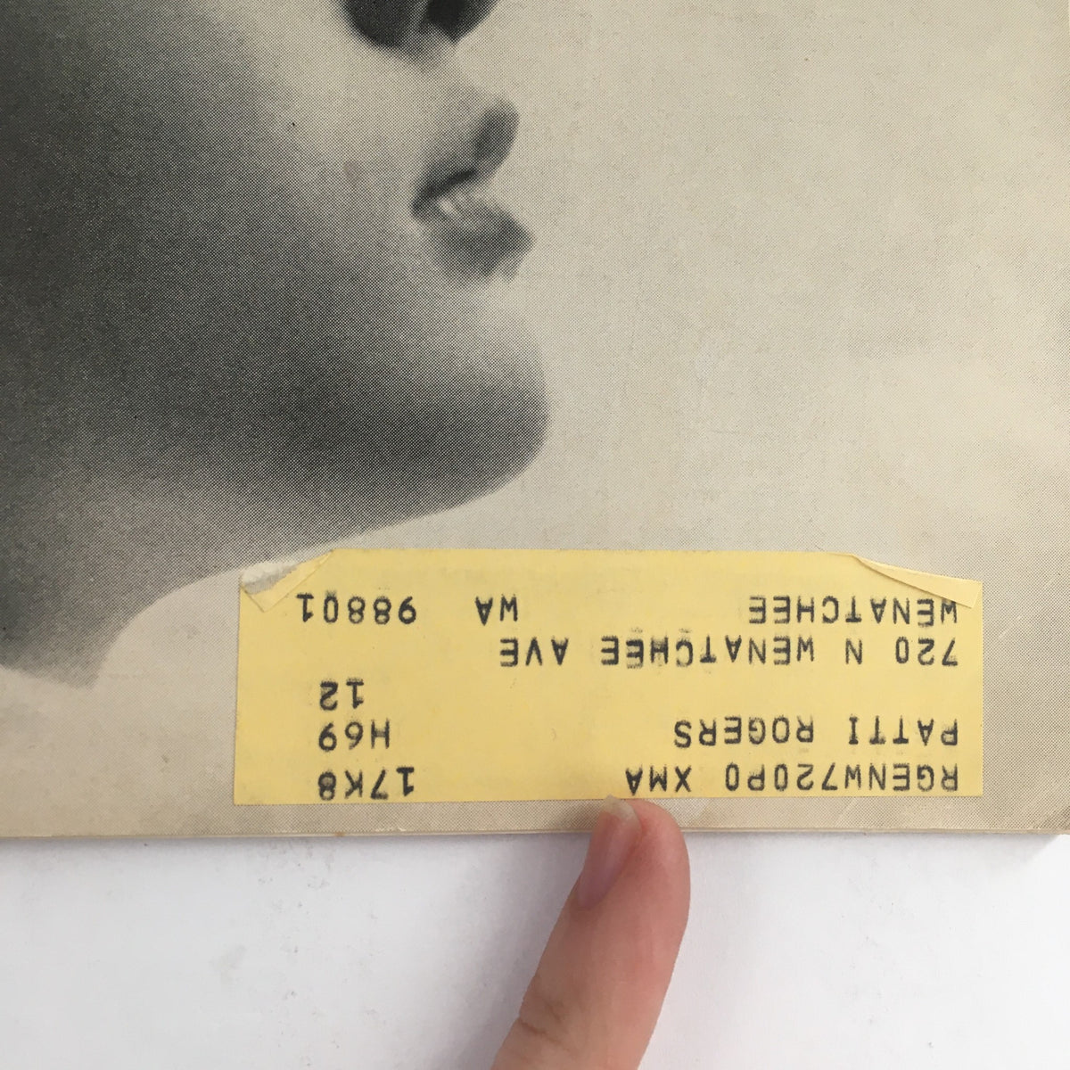 Close-up of the cover of Vintage American Girl Magazine January 1969 'You Here and Now,' highlighting a yellow address label at the bottom, representing its vintage condition and authenticity.