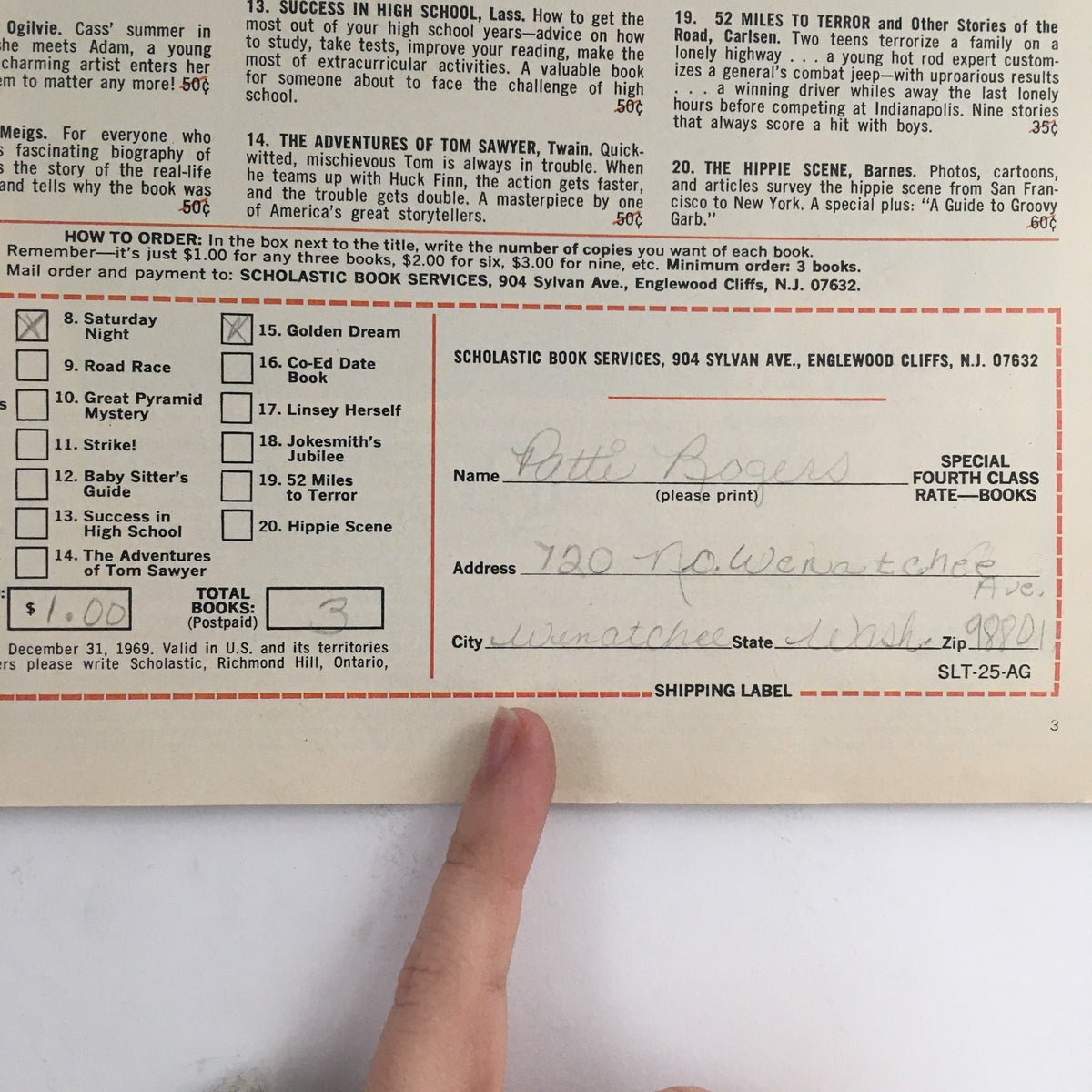 Back of a shipping label in the American Girl Magazine November 1969, with handwritten name and address details for the magazine's subscription.