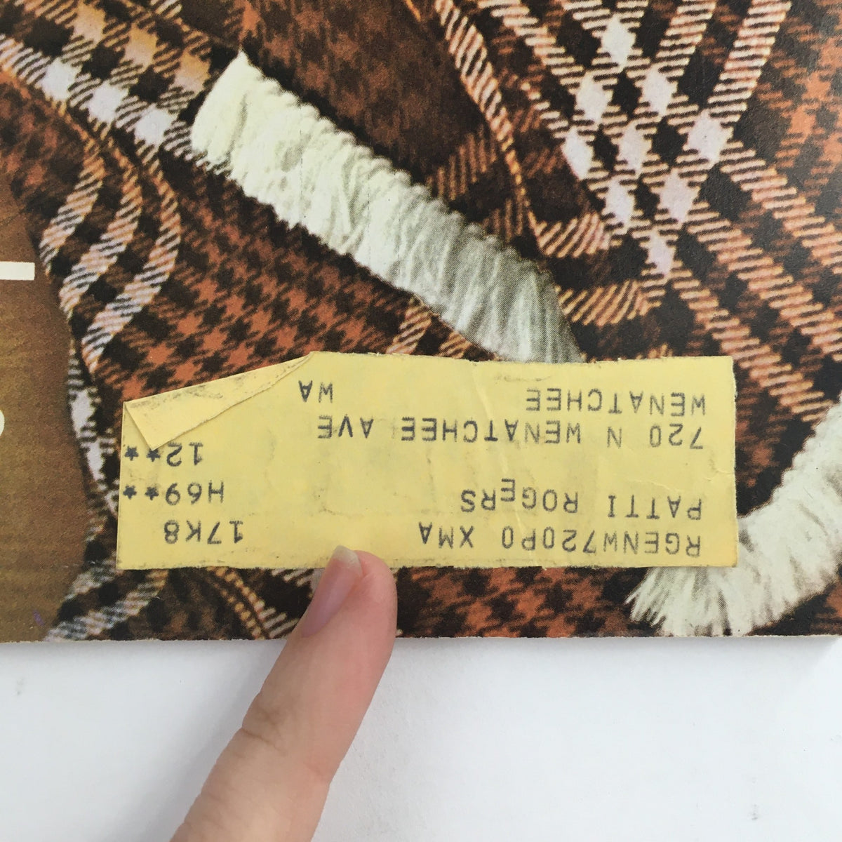 Close-up of a yellow address label on the cover of American Girl Magazine August 1969, which reads details about the magazine's original location, enhancing its vintage collectible quality.