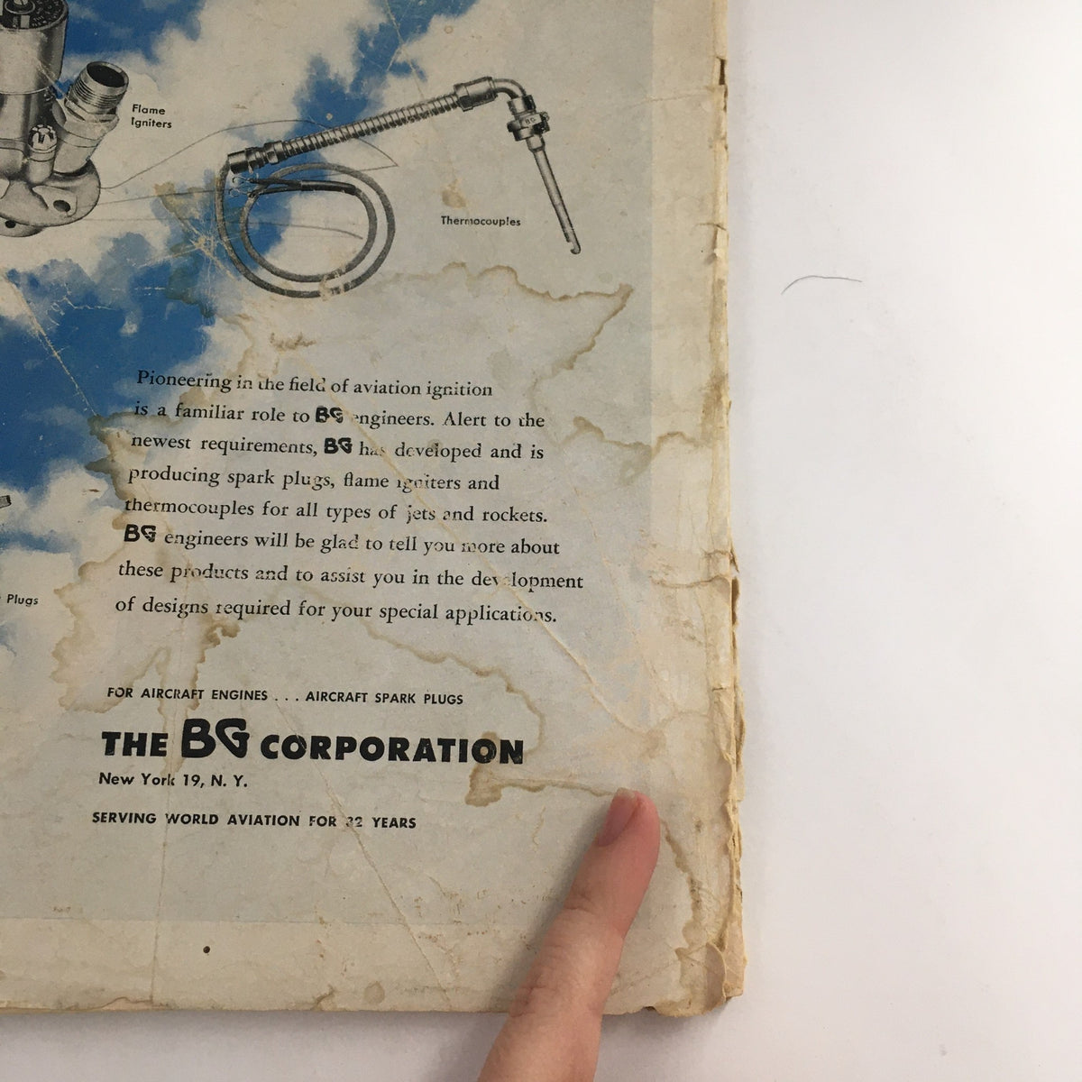Back cover of Aero Digest from July 1949, featuring an advertisement for aviation ignition systems by the BG Corporation, showcasing vintage design and technology.