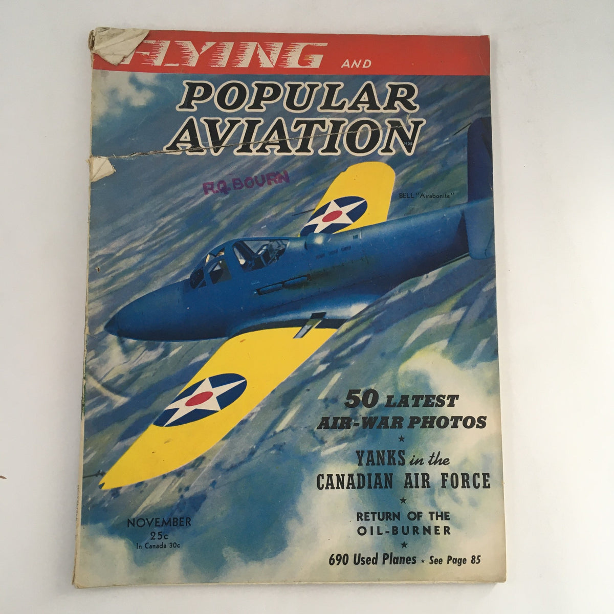 Cover of Flying & Popular Aviation Magazine Vol 27 #5 from November 1940, featuring a blue aircraft with yellow wings and air force insignia.