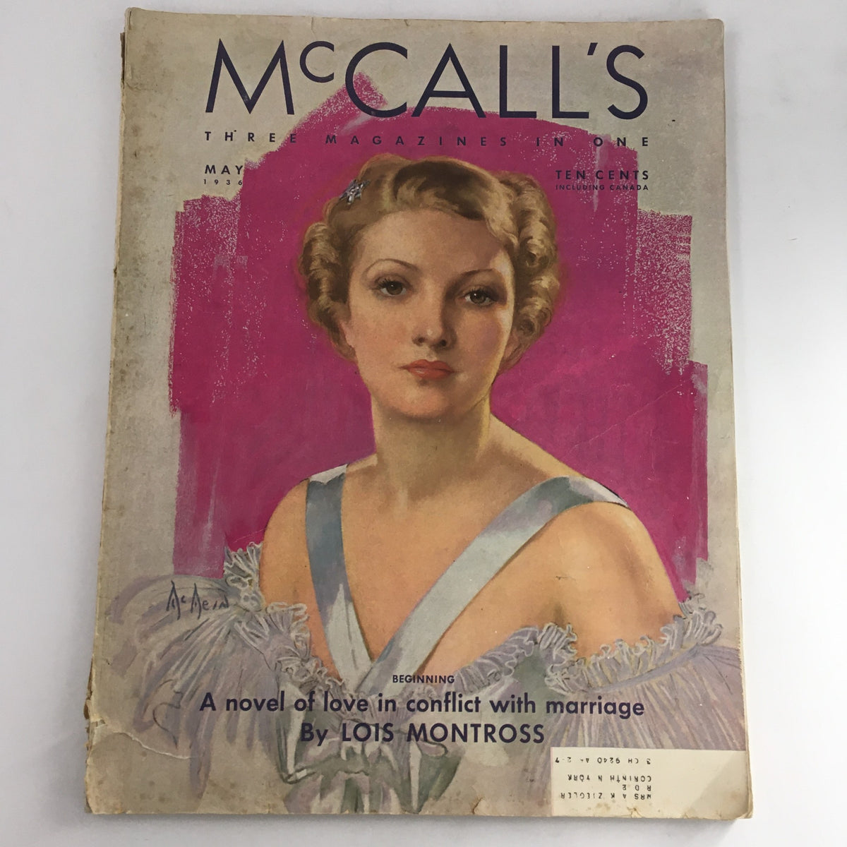 Cover of McCall's Magazine May 1936 featuring artwork and the title 'A novel of love in conflict with marriage by Lois Montross'.