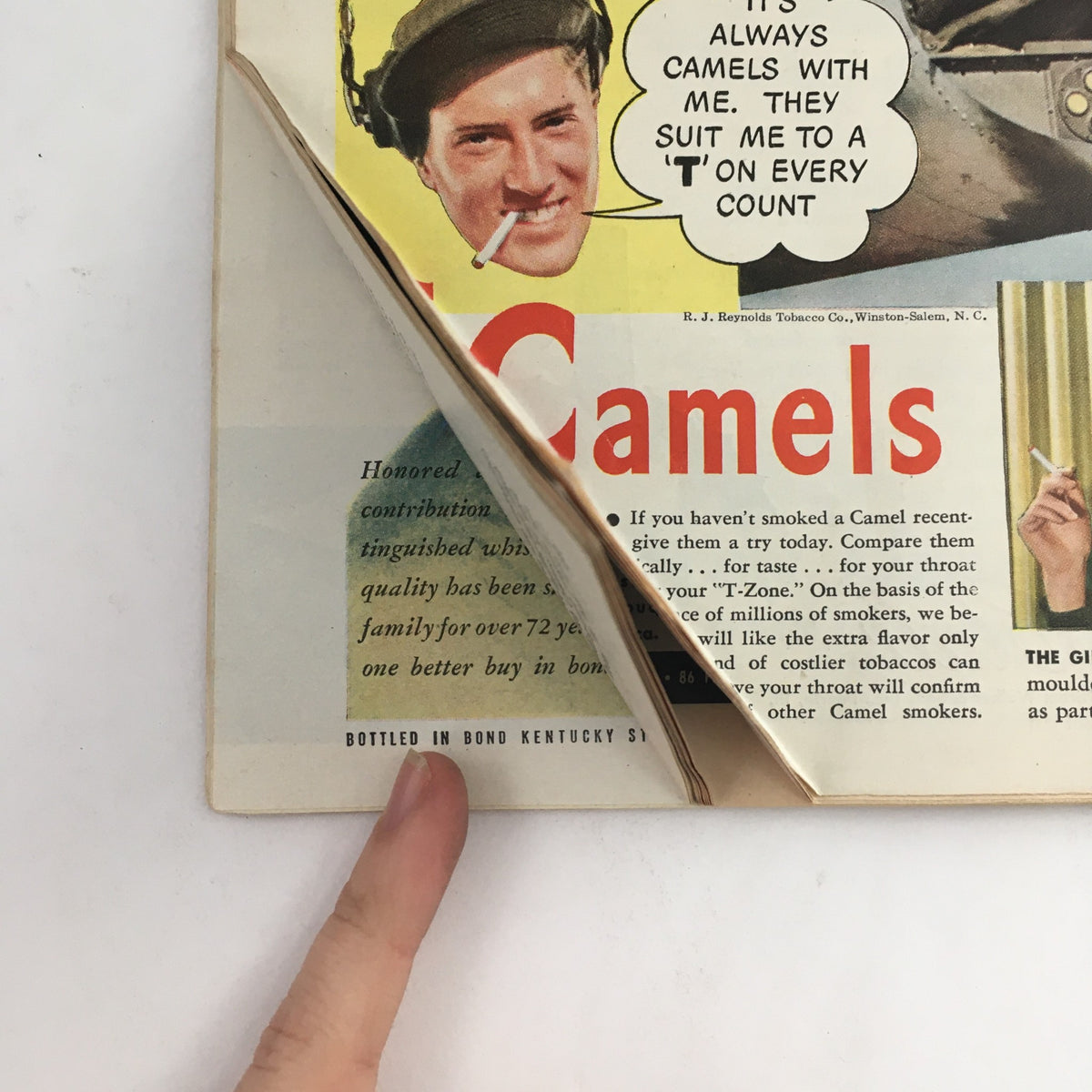 Interior page of Time Magazine December 20 1943, displaying an advertisement for Camel cigarettes, emphasizing the brand's appeal with a smiling young man.