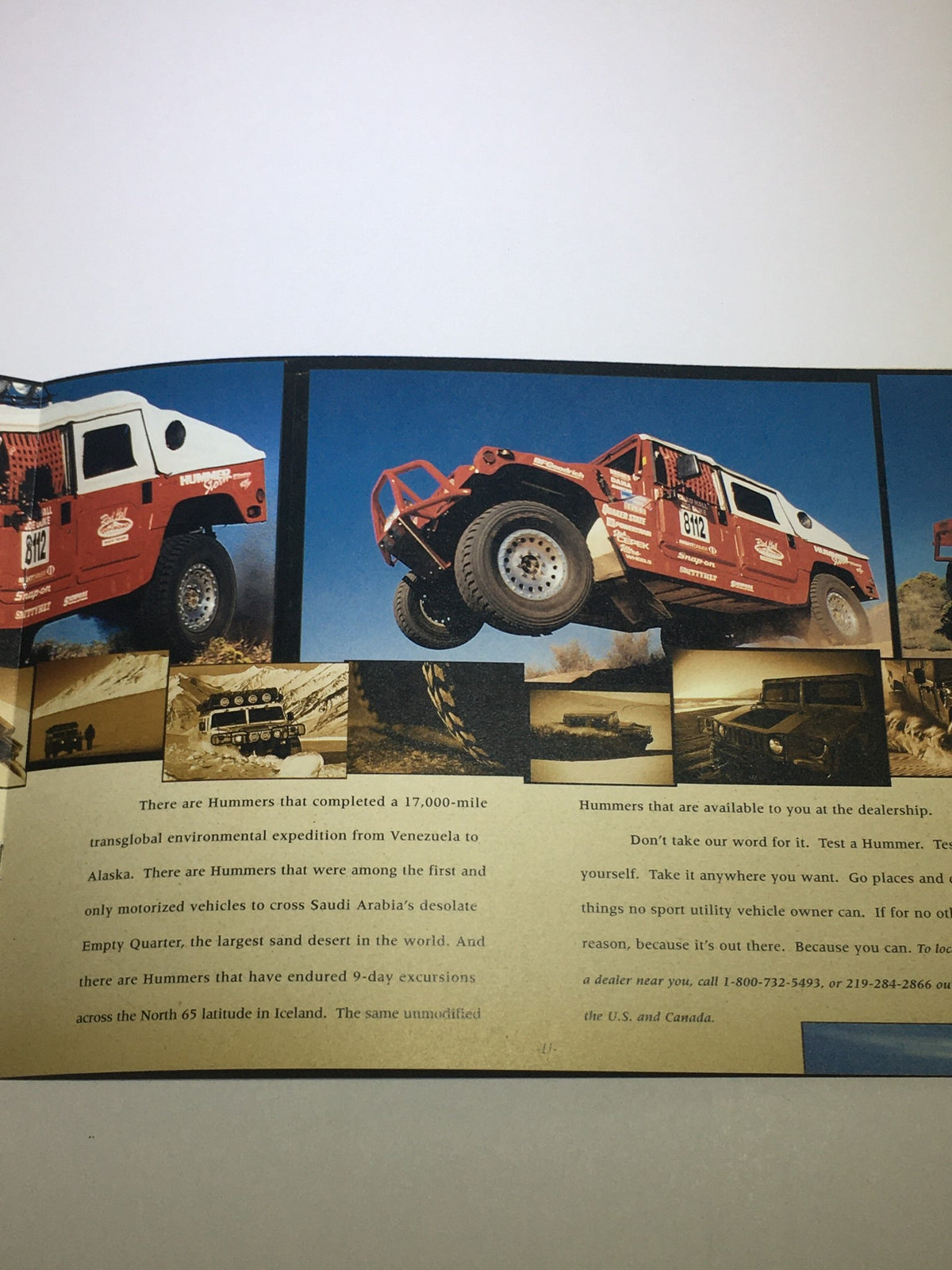 Inside spread of the 1998 Hummer 4x4 Dealership Car Auto Brochure Catalog showcasing adventure-related images of Hummer vehicles in rugged terrain.