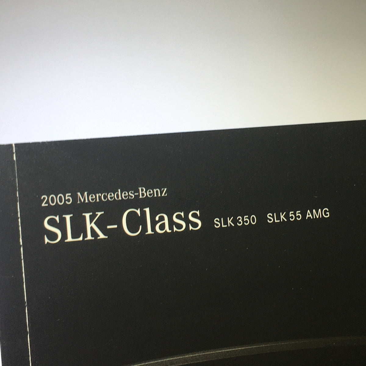 Title page of the 2005 Mercedes-Benz SLK-Class 350 55 AMG brochure highlighting SLK-Class models.