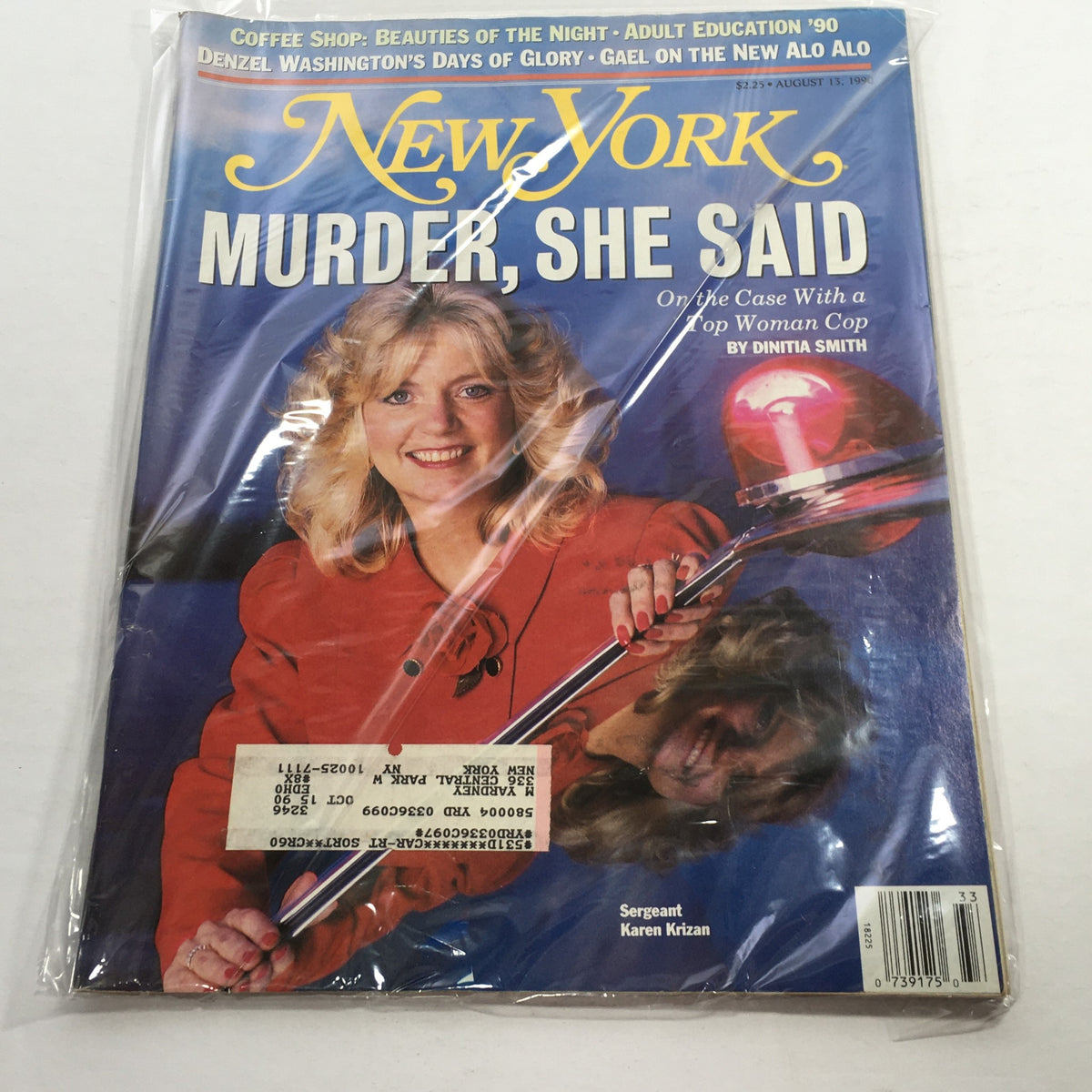 Cover of New York Magazine dated August 13, 1990, featuring the title 'Murder, She Said' by Dinitia Smith, showcasing a woman cop, with a bright blue background and a red blazer, along with a police light.