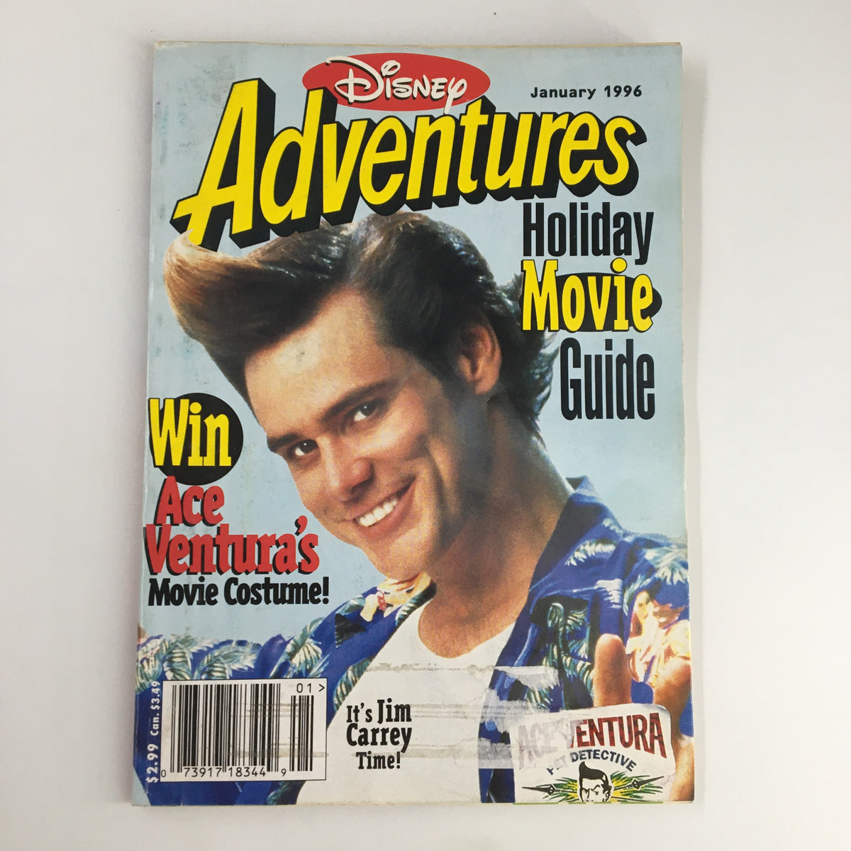 Cover of Disney Adventures Magazine from January 1996 featuring Jim Carrey as Ace Ventura, Pet Detective, promoting a contest to win Ace Ventura's movie costume, showcasing vibrant colors and nostalgic 90s pop culture.