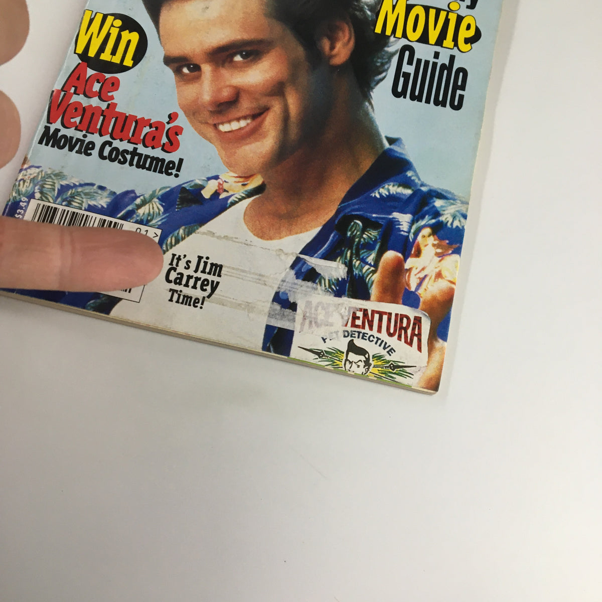 Close-up of the January 1996 Disney Adventures Magazine cover with Jim Carrey as Ace Ventura, highlighting the text 'It's Jim Carrey Time!' and the contest details, emphasizing the magazine's collectible value.