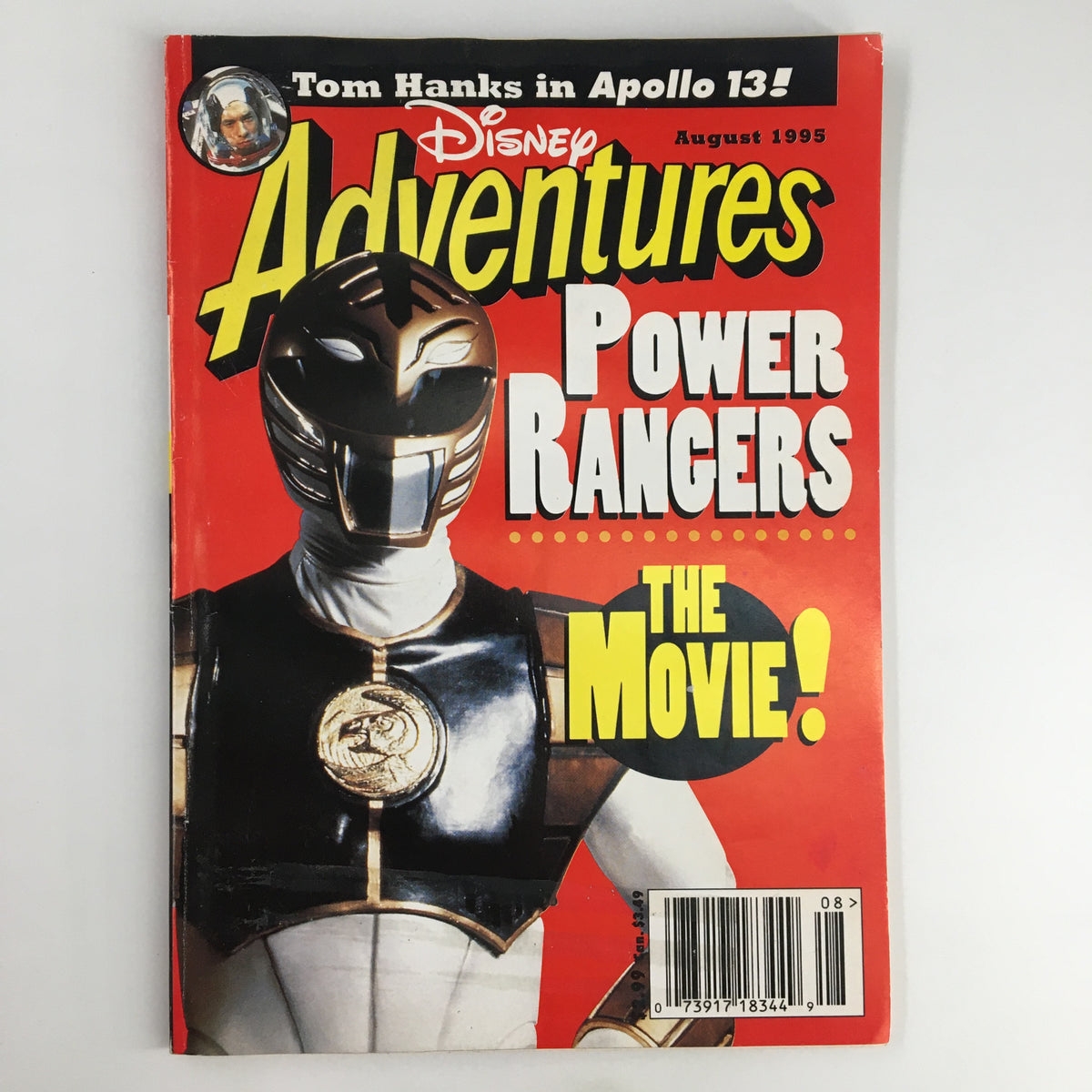 Disney Adventures Magazine, August 1995 edition, featuring Power Rangers on the cover, highlighting Tom Hanks in Apollo 13. Iconic vintage magazine showcasing nostalgic pop culture.