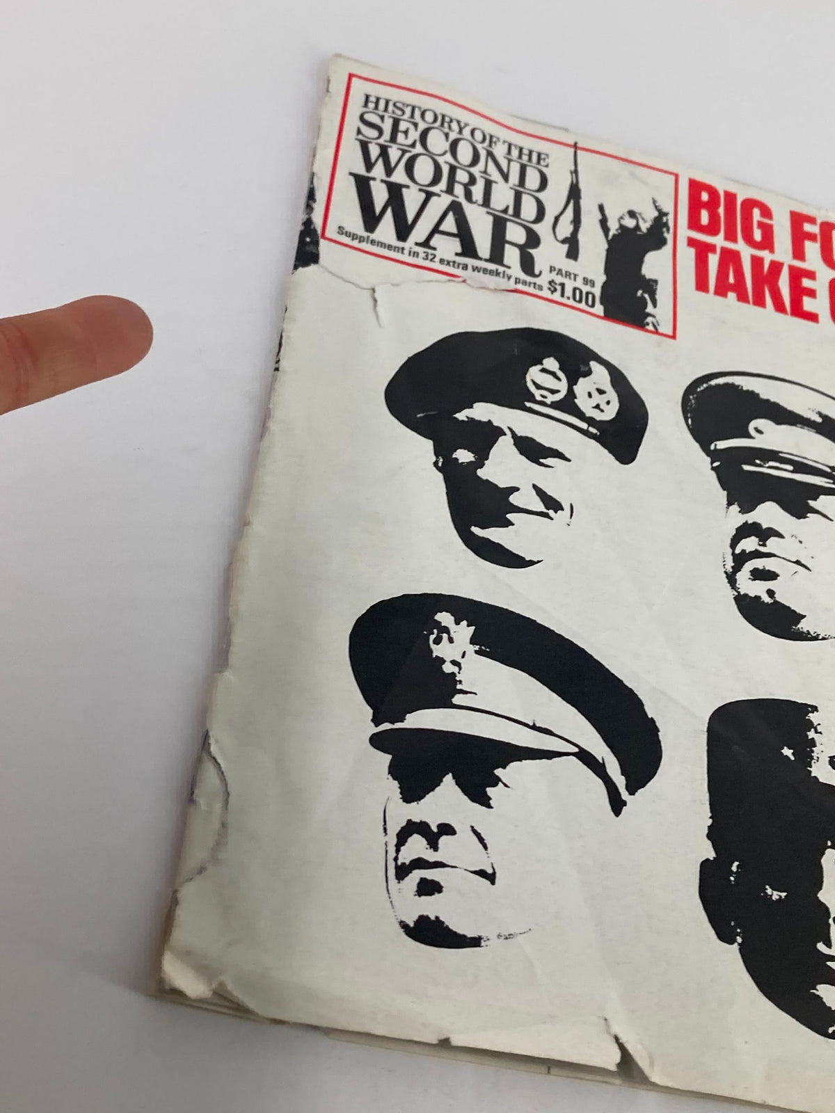 Close-up view of the cover of VTG History of the Second World War Part 99 1975 showing the details of the title 'Big Four Take Over' and a hand pointing at it.