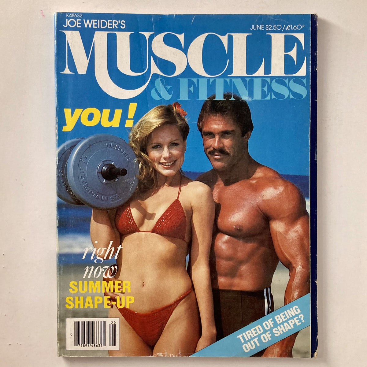 Cover of Joe Weider's Muscle & Fitness Magazine June 1980 Right Now Summer Shape-Up featuring a couple at the beach, with the woman in a red bikini holding weights and the man displaying muscular physique.