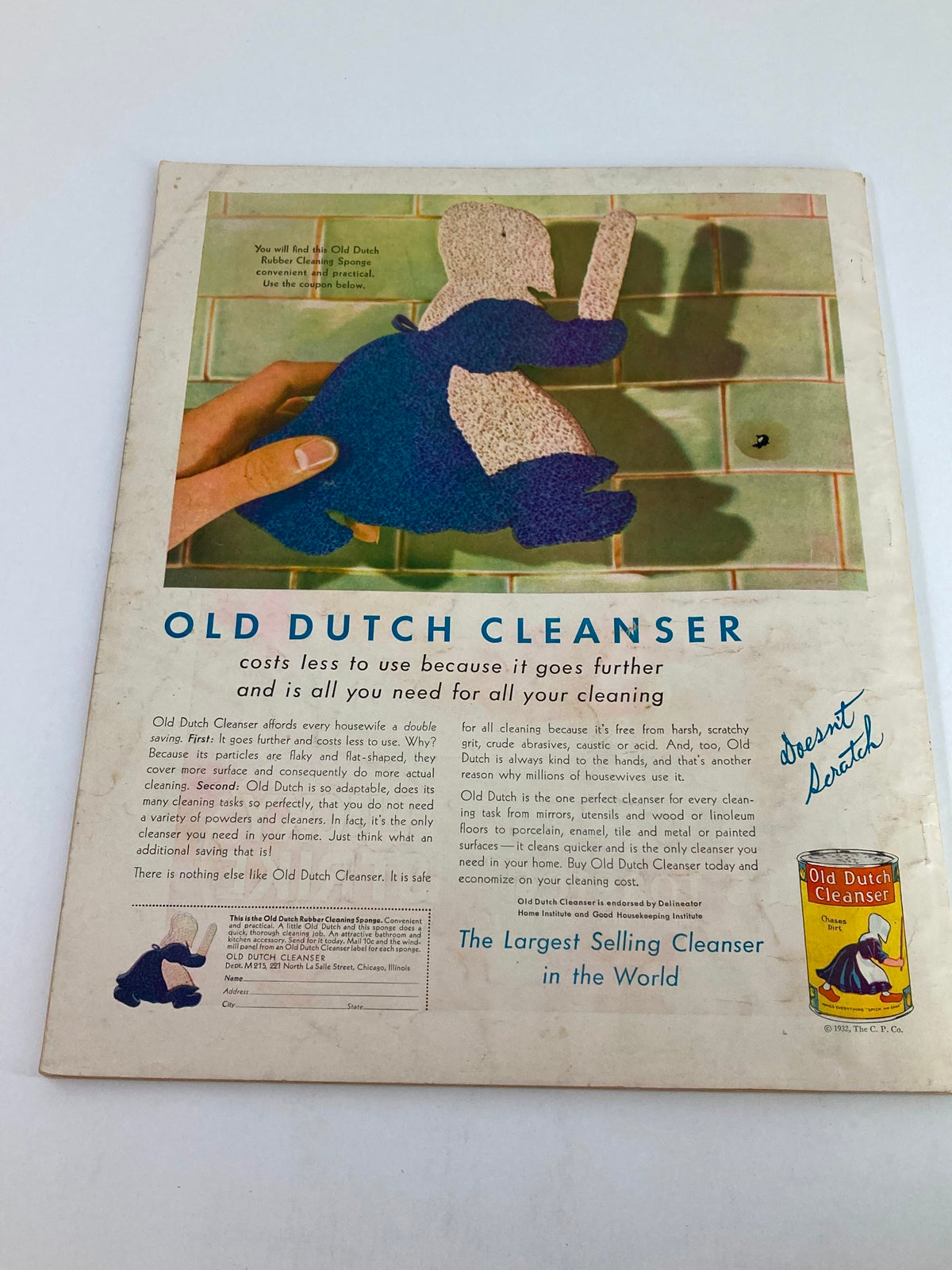 Back cover of VTG Delineator Magazine September 1932 displaying an advertisement for Old Dutch Cleanser with a playful design and informative text about cleaning products.
