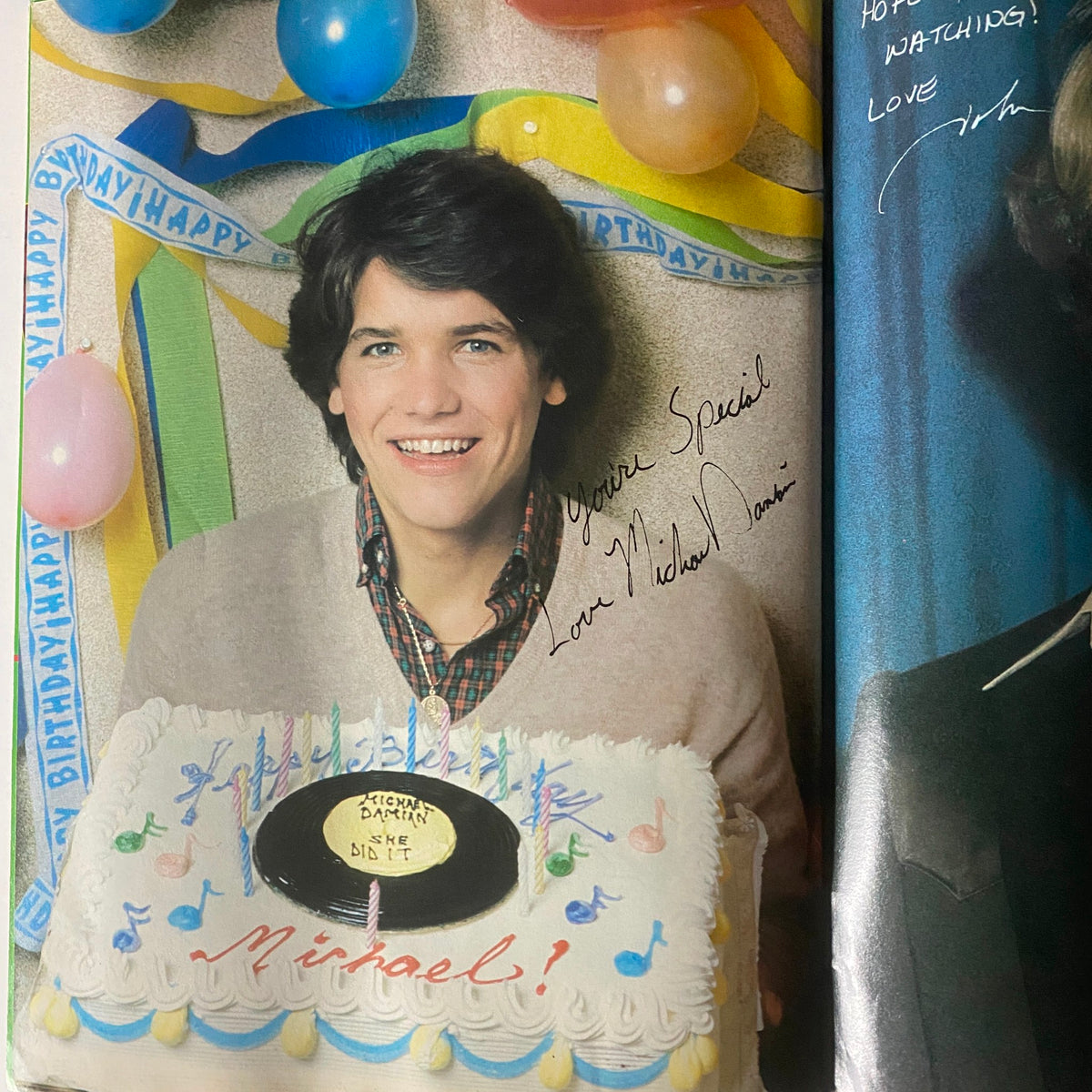 Michael Damian smiling in front of a birthday cake holding a personalized message, featured in Tiger Beat Magazine August 1981 Ralph Macchio, Michael Damian w Poster.
