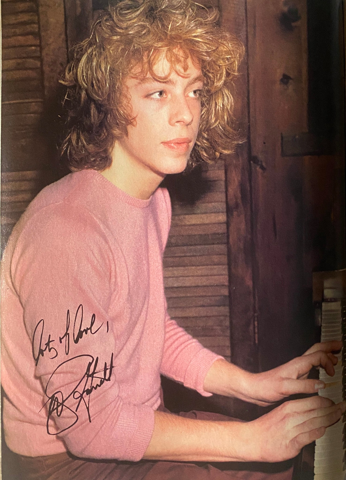 Photograph of a young teen idol at a piano from the October 1980 issue of Tiger Beat Magazine, capturing the essence of youthful charm from the magazine's era.