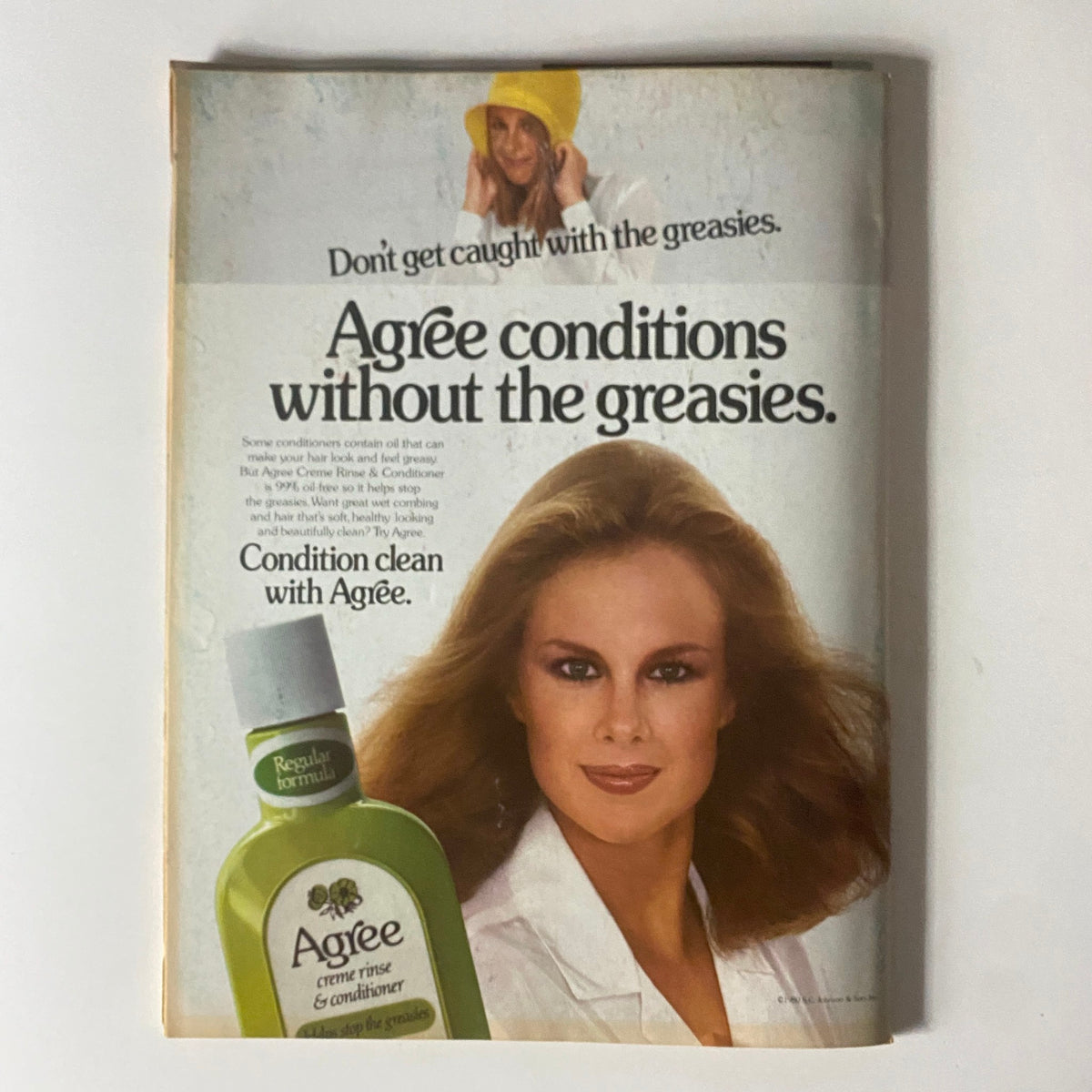Retro advertisement for Agree hair conditioner, showcasing a model with healthy hair, featured in the Tiger Beat Magazine December 1980 issue.