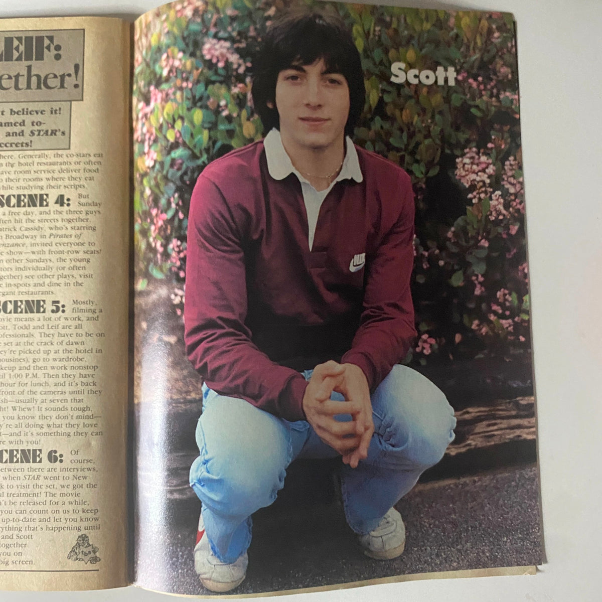Scott posing amidst flowers in a vintage photo featured in Tiger Beat Star Magazine August 1982, reflecting 1980s youth culture.