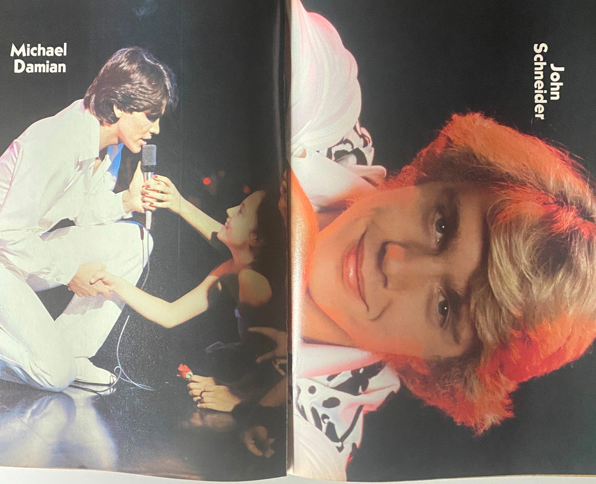 April 1982 Tiger Beat Star Magazine featuring Michael Damian performing on stage with a female fan in the audience and John Schneider smiling, representing iconic teen idols of the 80s.