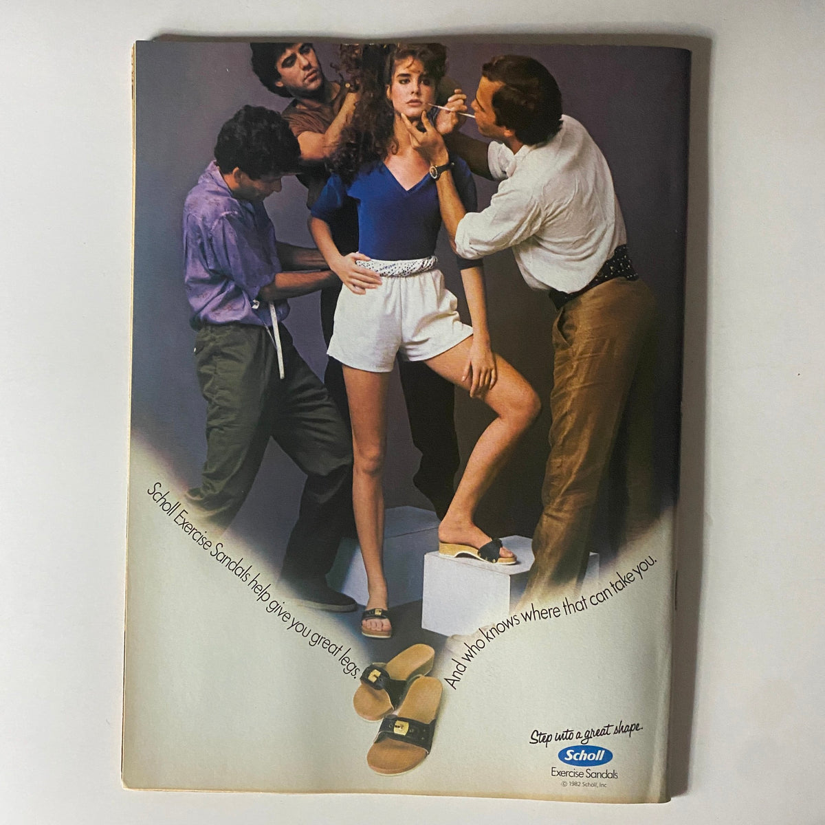 April 1982 Tiger Beat Star Magazine advertisement for Scholl Exercise Sandals featuring a model with stylists, reflecting 80s fashion trends.