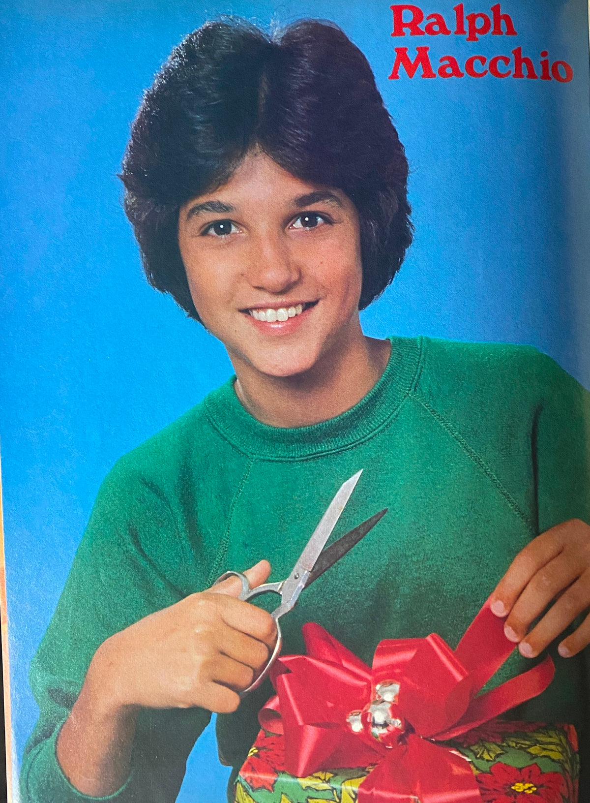 Ralph Macchio featured in Tiger Beat Star Magazine January 1982, smiling while holding scissors and a gift, representing the magazine's focus on teenage celebrities.