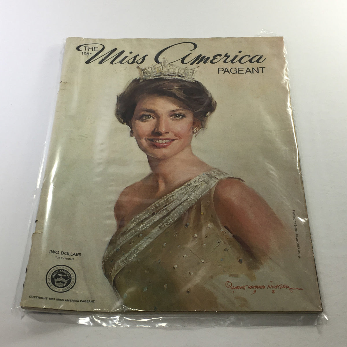 1981 The Miss Nebraska Pageant magazine cover featuring a portrait of Susan Powell, who later became Miss America, showcasing her elegance in a glamorous dress with a tiara.