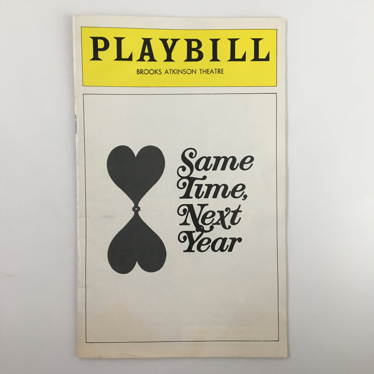 1977 Playbill from the Brooks Atkinson Theatre featuring Sandy Dennis in the production of Same Time, Next Year. The Playbill cover has a simple yet striking design, highlighting the play's title elegantly.