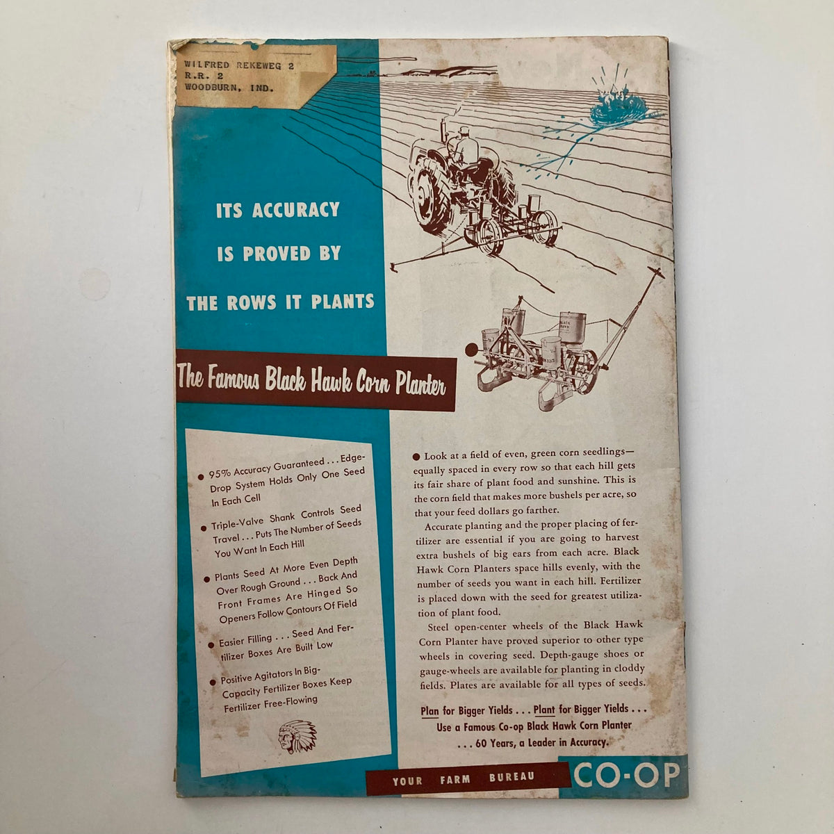 Back cover of The Hoosier Farmer Magazine March 1954, displaying an advertisement for the Famous Black Hawk Corn Planter, emphasizing its planting accuracy.