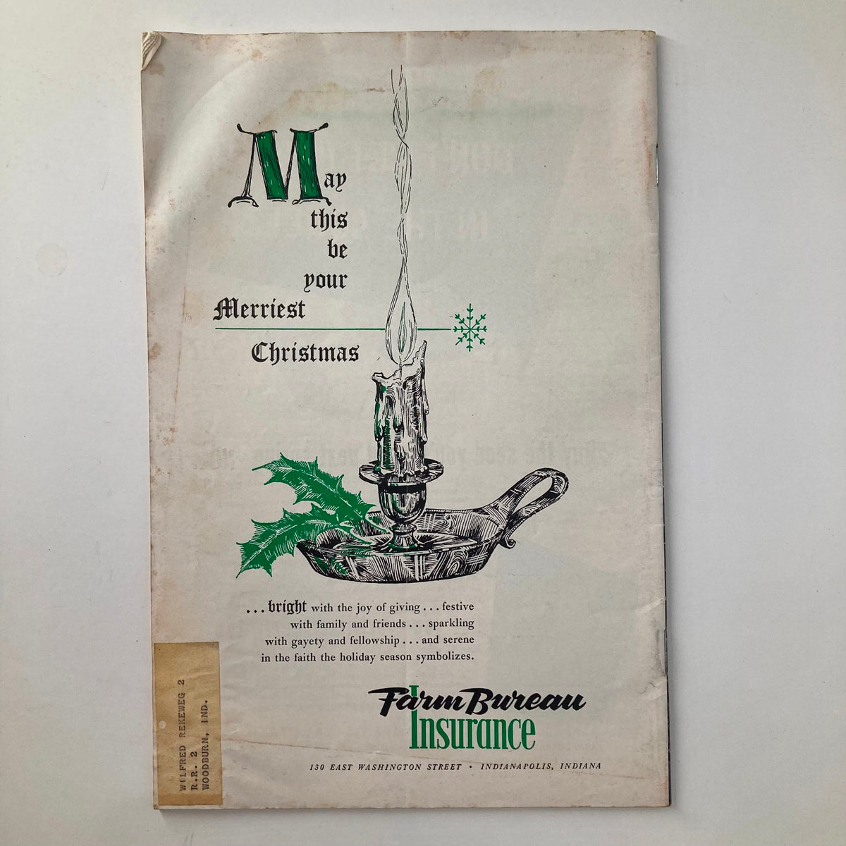 Back cover of VTG The Hoosier Farmer Magazine December 1954, featuring a vintage greeting message stating 'May this be your Merriest Christmas' with holiday-themed illustrations.