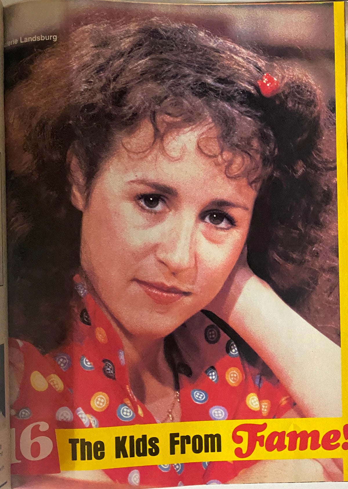 16 Magazine November 1982 - Close-up image of a young actress from The Kids From Fame, showcasing her curly hair and colorful outfit.