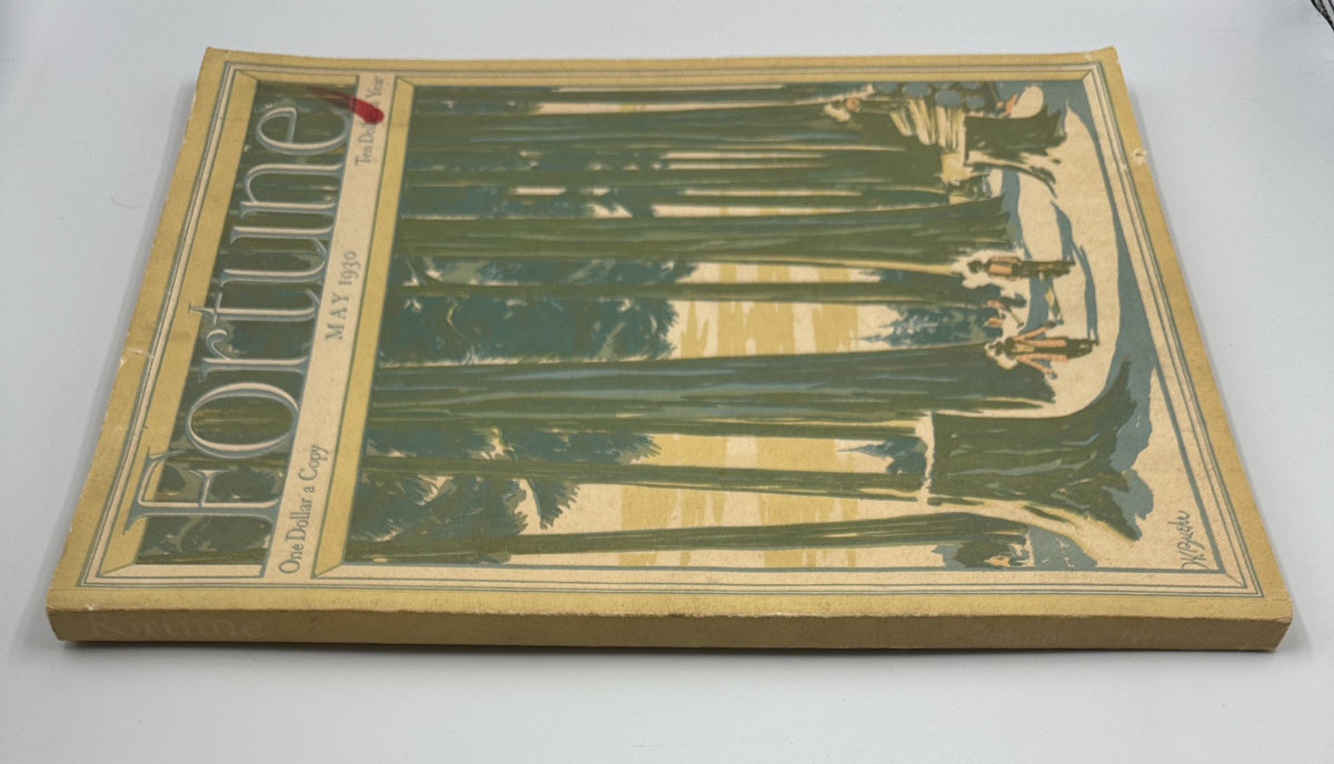 Side view of Fortune Magazine, May 1930, highlighting forest-themed cover art by W. B. Sykes and magazine's spine.