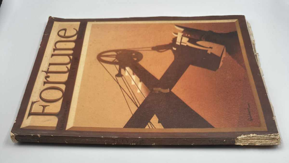 Side view of Fortune Magazine July 1938, highlighting the oil pump jack cover art and spine wear indicative of vintage magazine condition.