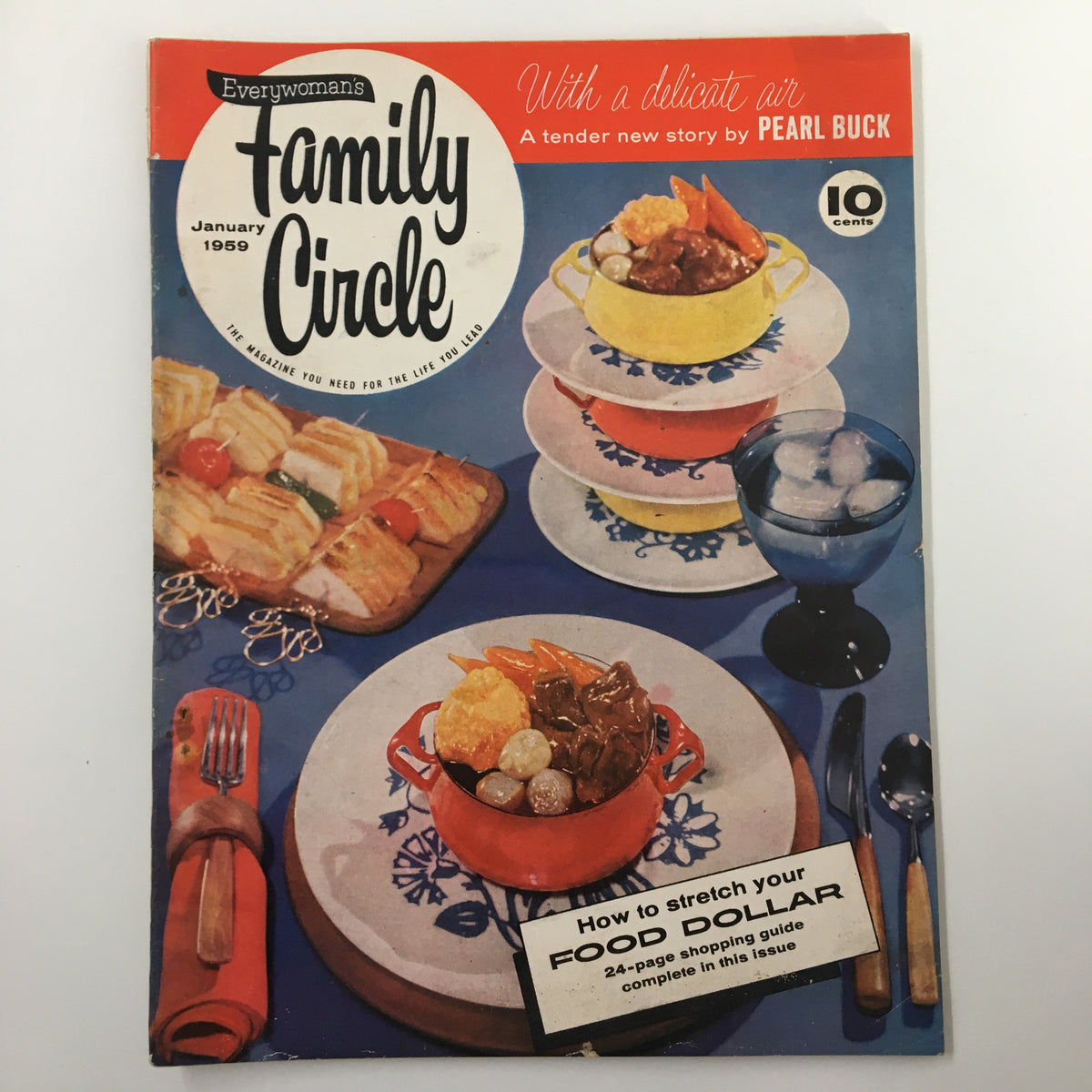 Cover of VTG Family Circle Magazine January 1959, featuring a colorful display of food items, including a yellow pot and various dishes. Titled 'How To Stretch Your Food Dollar', this vintage issue highlights frugal living and budgeting tips from the 1950s.