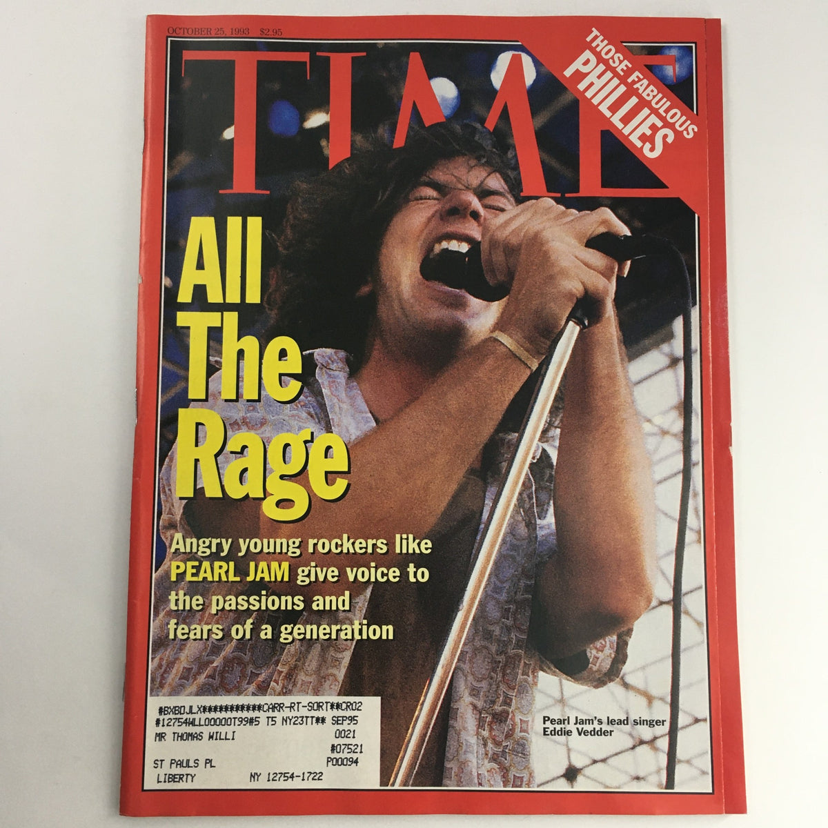 Cover of Time Magazine from October 25, 1993, featuring the title 'All The Rage' and an image of Pearl Jam's lead singer Eddie Vedder performing, highlighting the cultural impact of 90s grunge music.