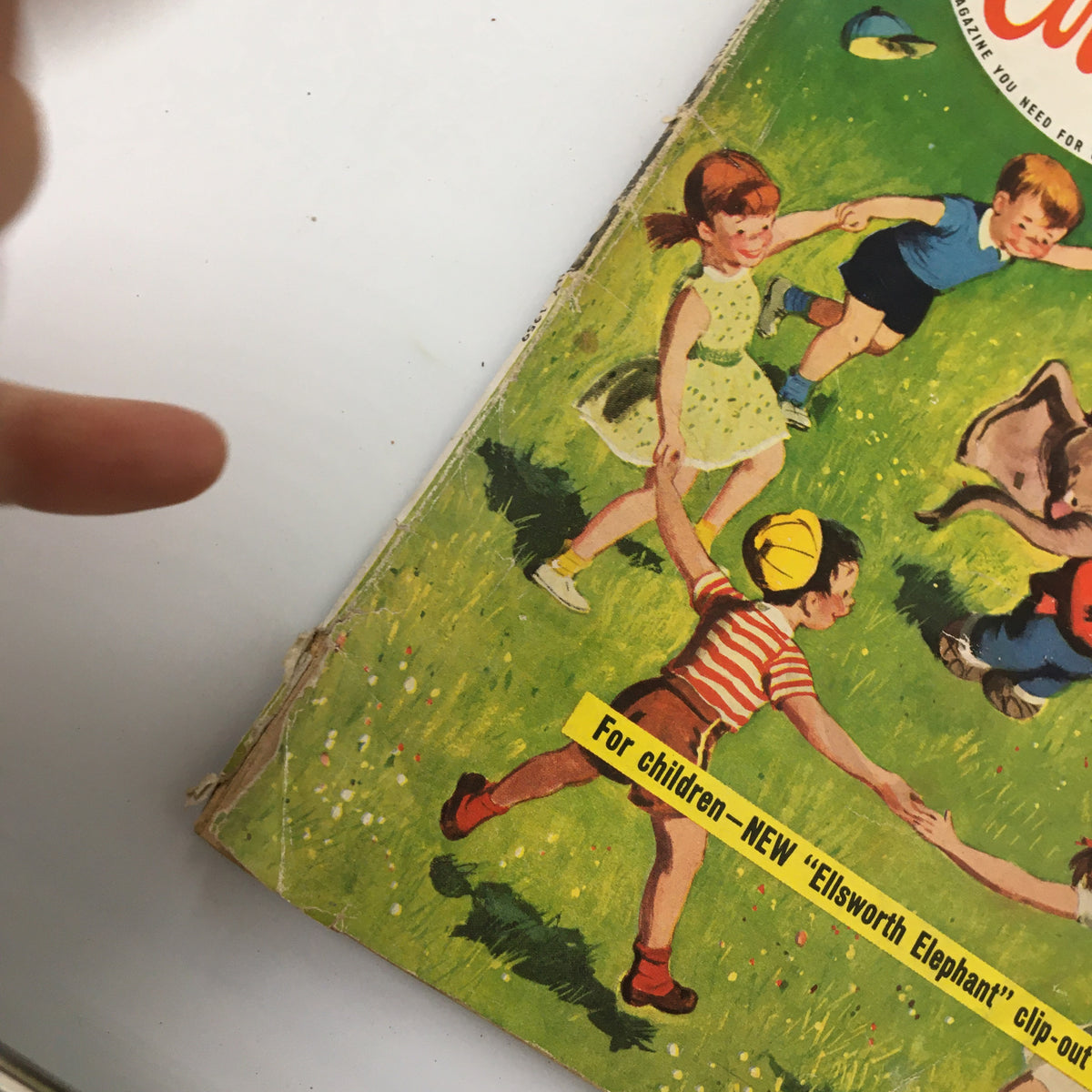 Close-up of the cover of VTG Family Circle Magazine July 1959, showcasing children and Ellsworth Elephant, illustrating the nostalgic charm of vintage children's literature.