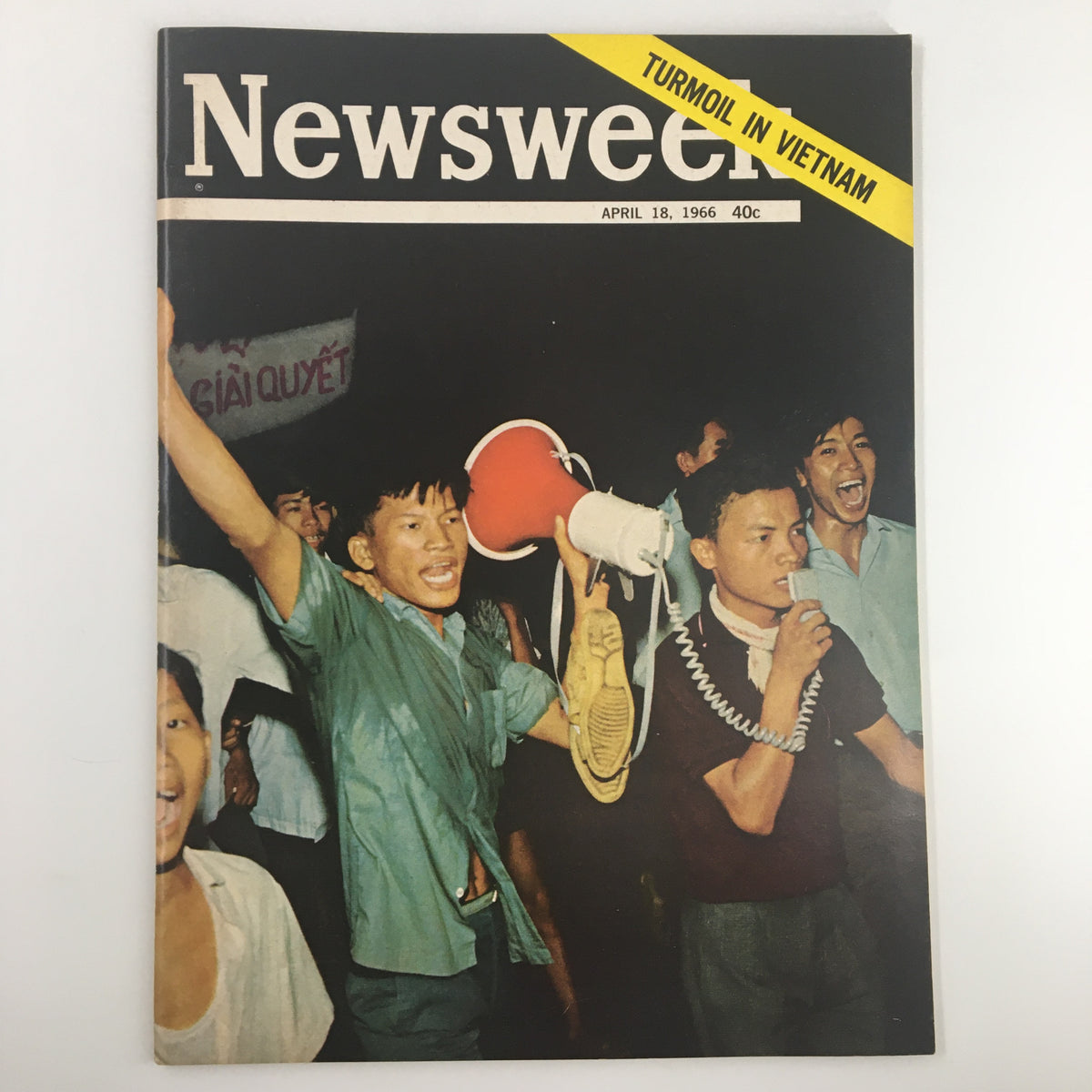 Cover of vintage Newsweek magazine from April 18, 1966, titled 'VTG Newsweek Magazine April 18 1966 The Turmoil in Vietnam', featuring a group of people protesting and holding a megaphone, reflecting the tumultuous events of the Vietnam War.