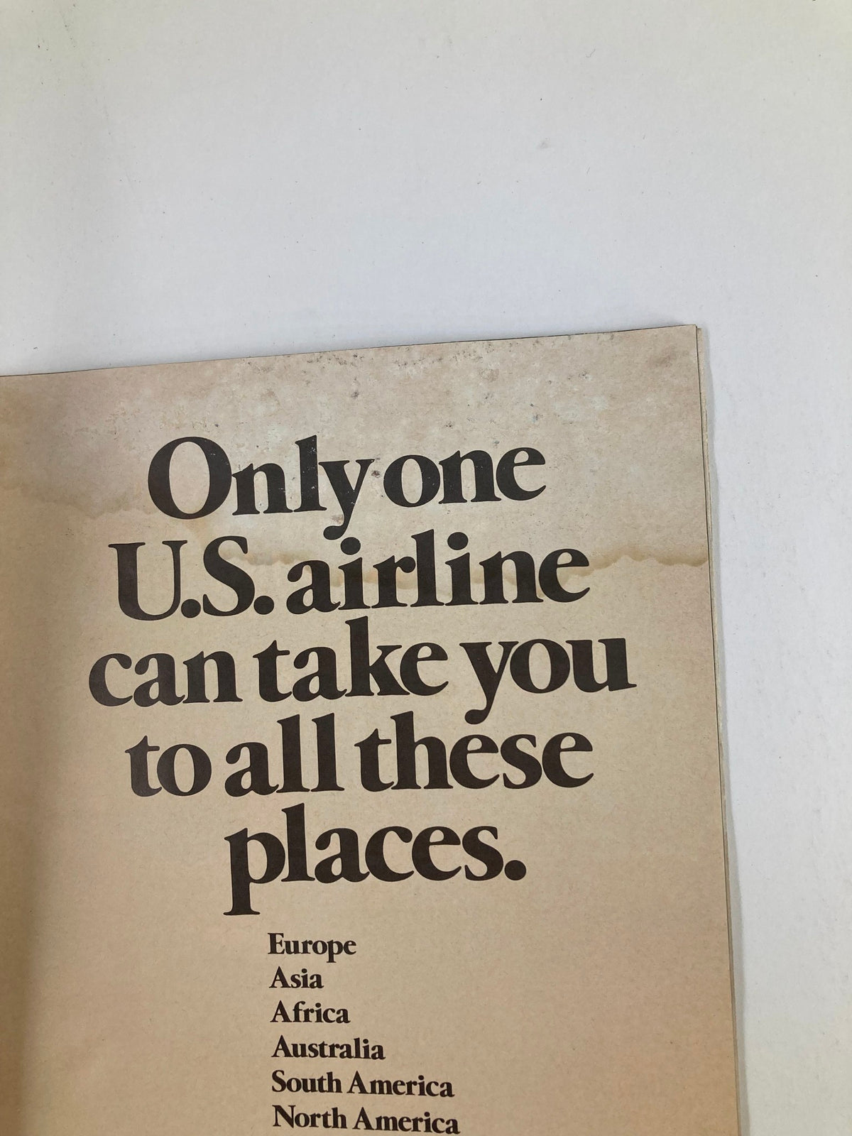 1975 Playbill from The Palace Theatre highlighting travel destinations with bold typography.