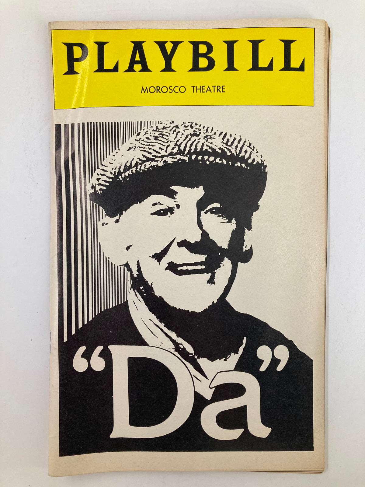 1978 Playbill from Morosco Theatre featuring the classic play 'Da' starring Barnard Hughes. Vintage design showcasing a smiling male figure wearing a hat.