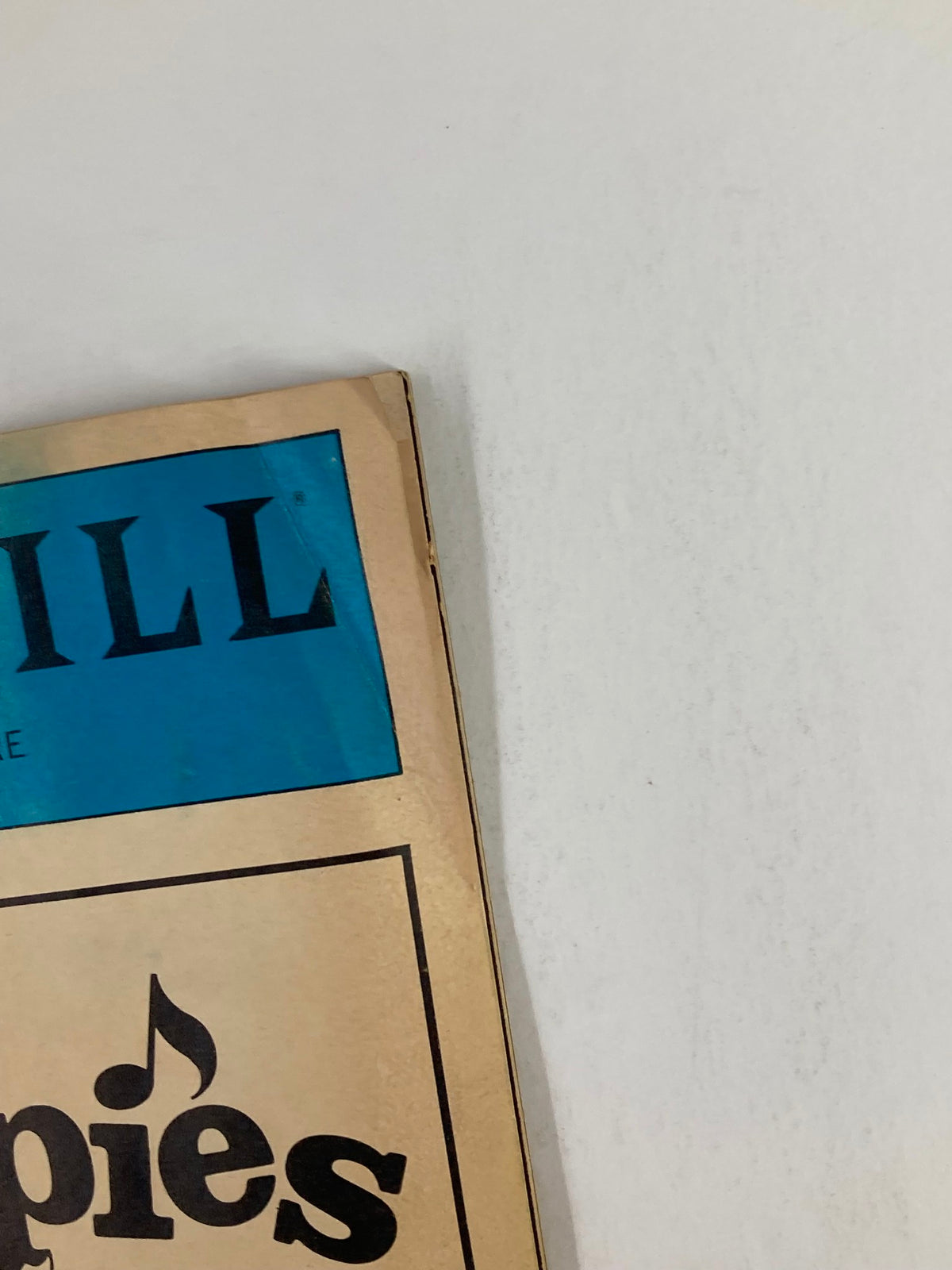 Close-up view of the top corner of the 1983 Showbill for 'Preppies' at the Promenade Theatre featuring Dennis Bailey and Bob Walton.