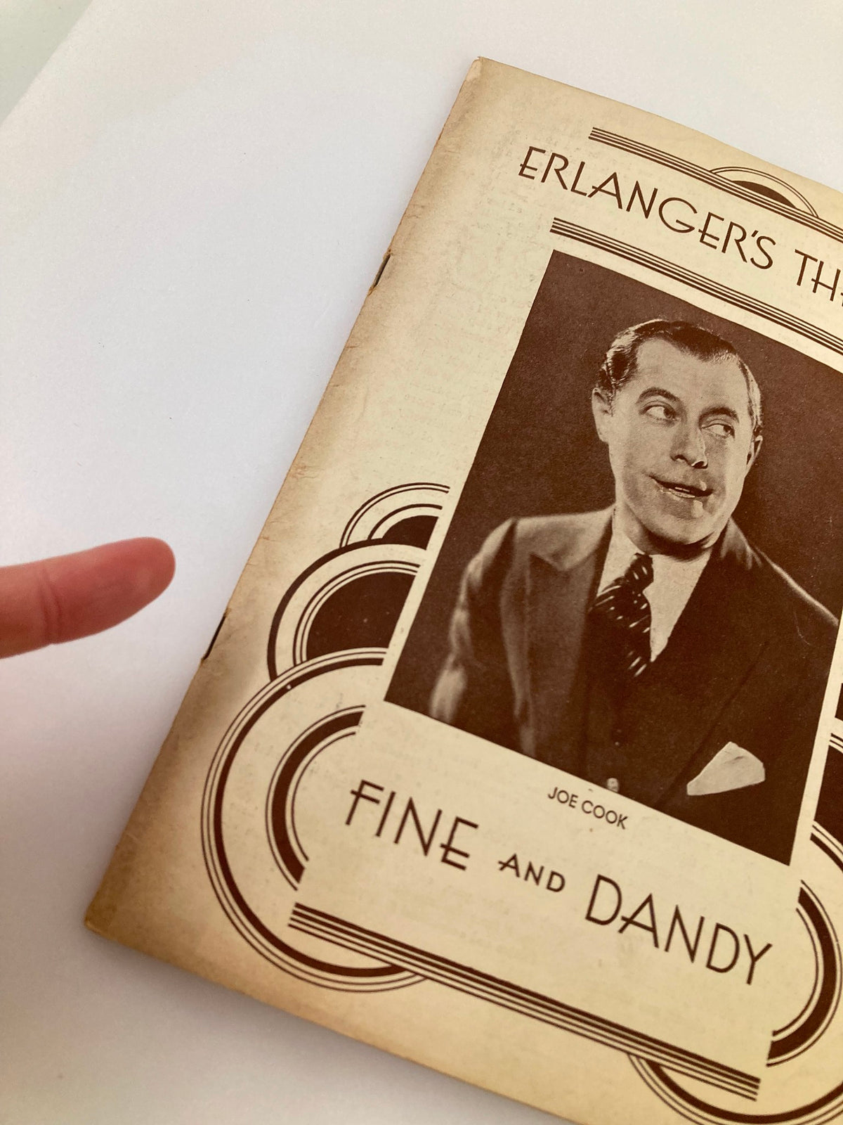 Side view of the 1930 Erlanger's Theatre program displaying Joe Cook in 'Fine and Dandy.' Includes details of the program's cover.