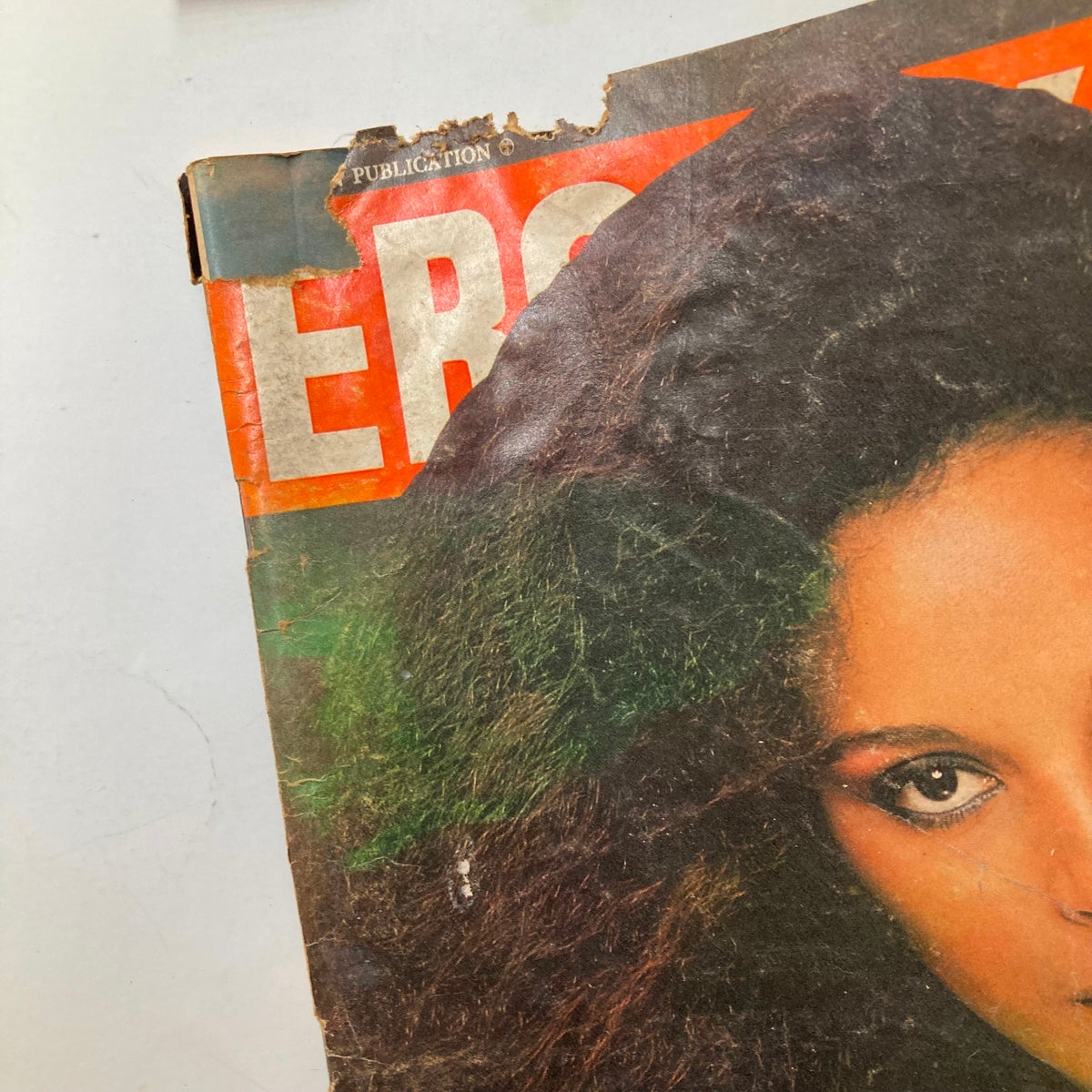 Ebony Magazine April 1981 featuring Jayne Kennedy on the cover, showcasing a close-up of her face with curly hair and a partially torn edge at the top.