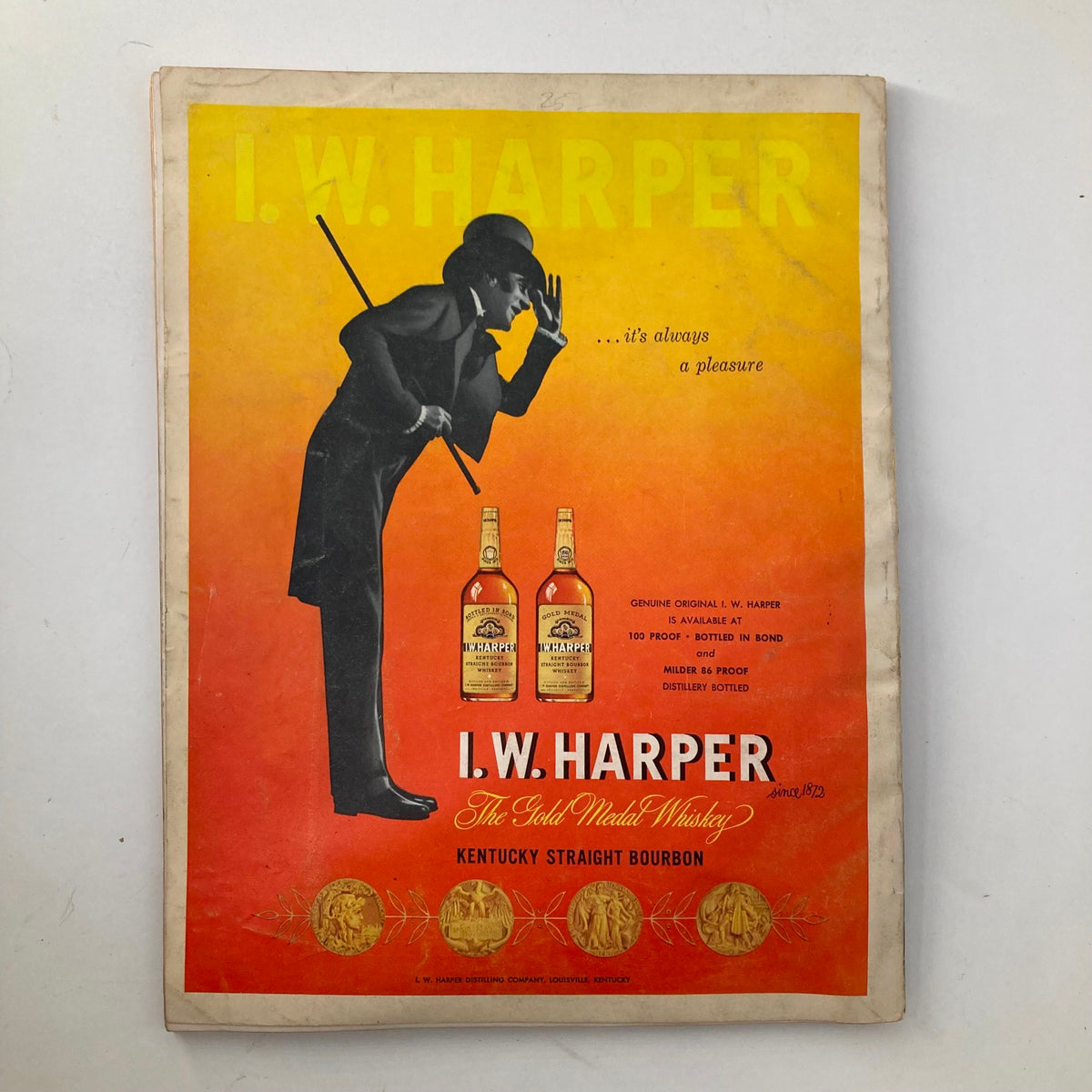 Advertisement page from VTG Esquire Magazine June 1956 featuring I.W. Harper whiskey with vintage design elements.