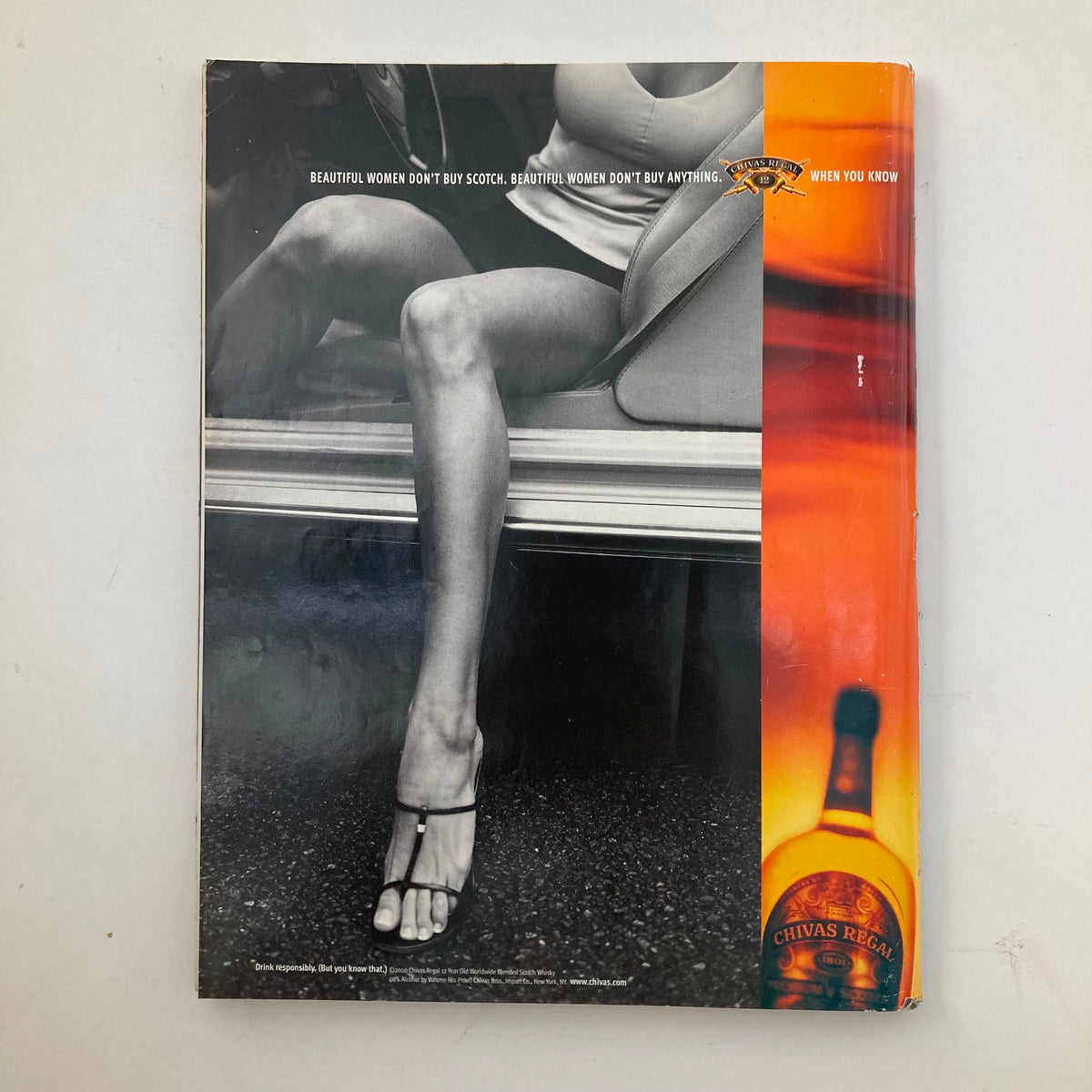Back cover of Sports Illustrated Magazine Winter 2000 featuring a stylish image of a woman's leg and high-heeled shoe, highlighting the blend of fashion and sports culture of the era.