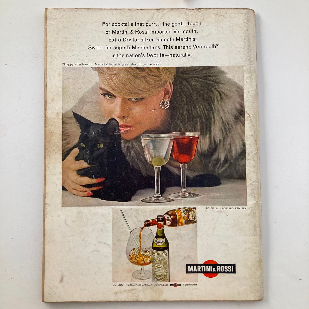 Back cover of the VTG Playboy Magazine June 1966 featuring a woman with a cat and Martini & Rossi vermouth advertisement.