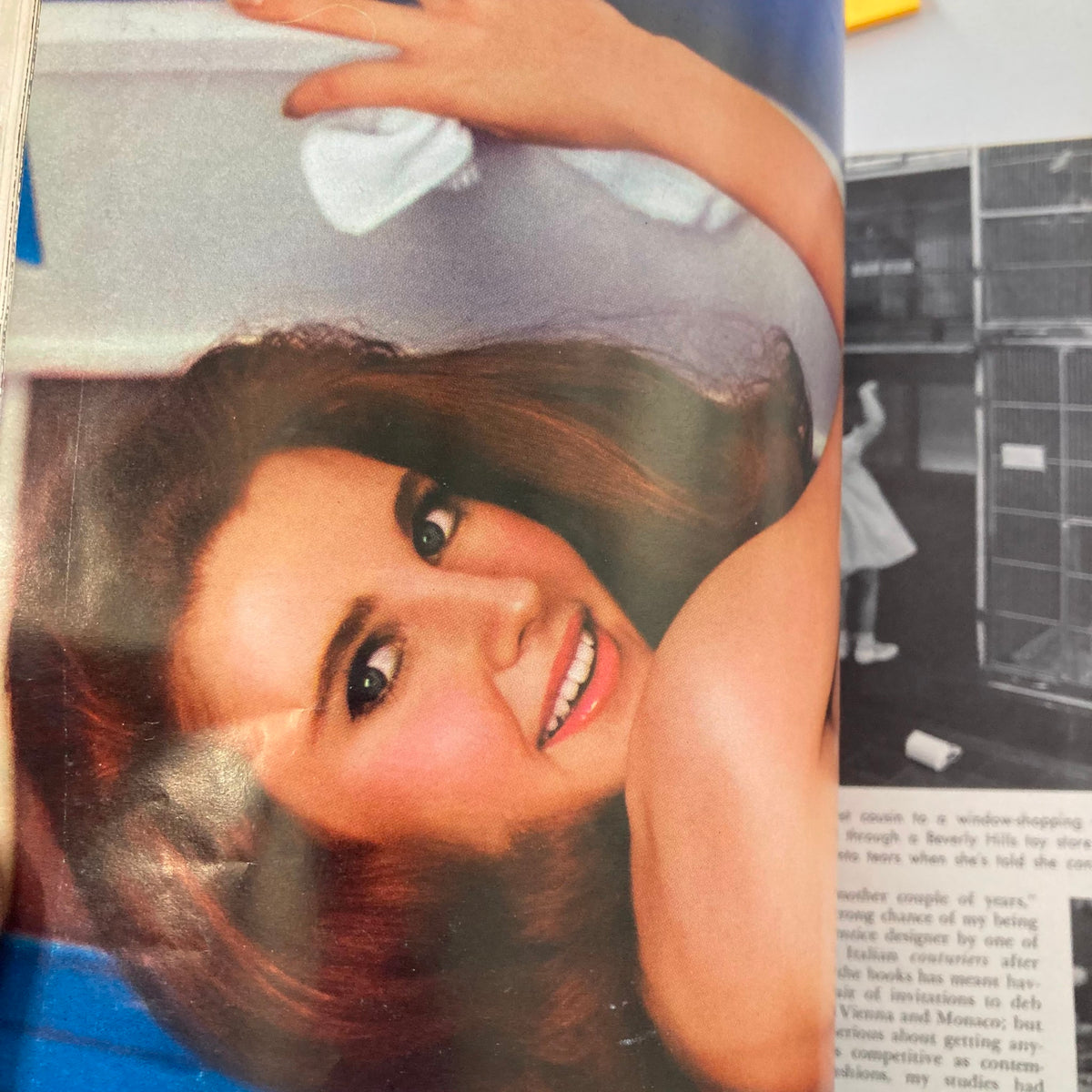 An image from VTG Playboy Magazine July 1966 featuring Playmate Tish Howard posing elegantly, embodying the classic allure of vintage Playboy centerfolds.