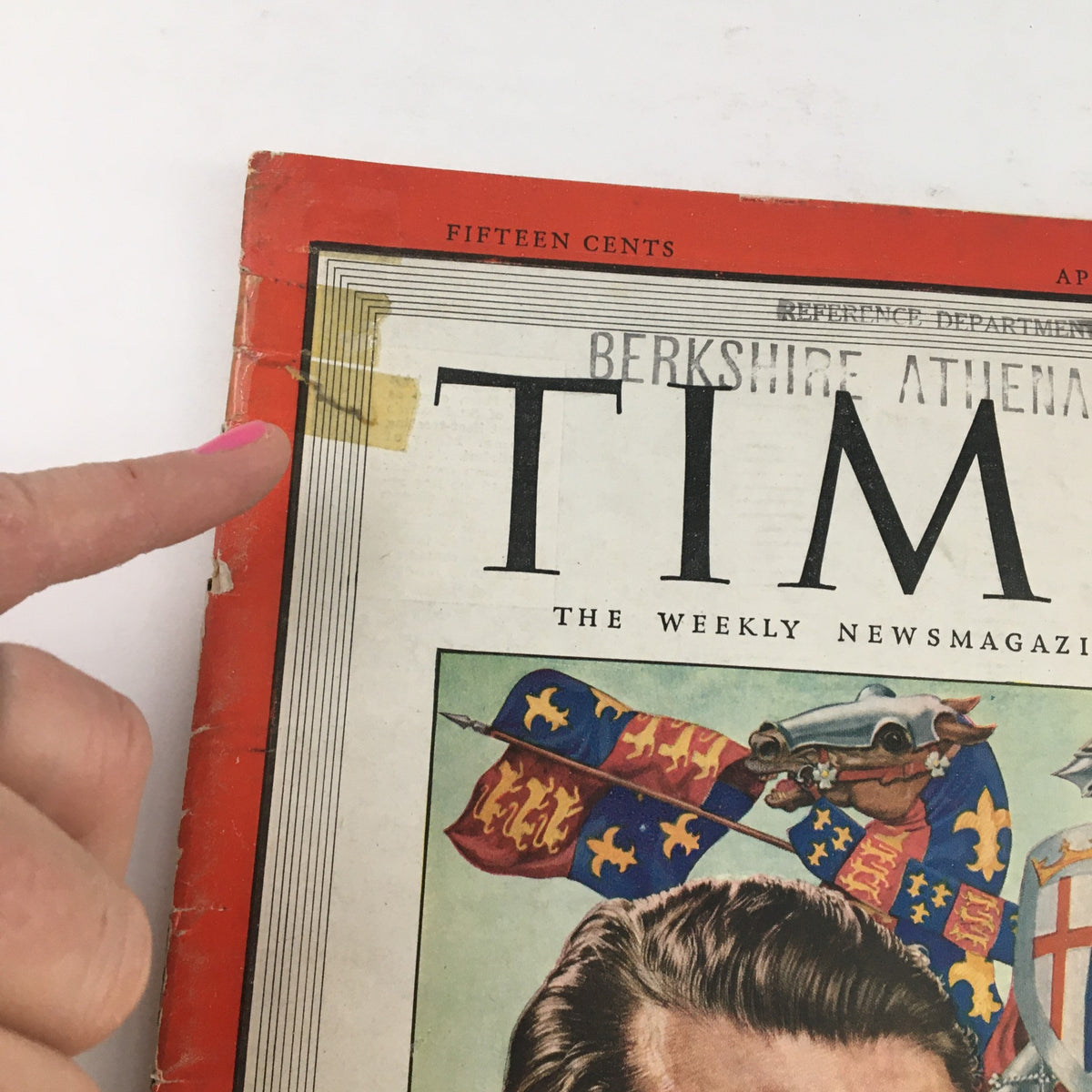 Close-up view of the Time Magazine cover from April 8, 1946, with a focus on the corner showing wear and detailing, featuring the portrait of Laurence Olivier.