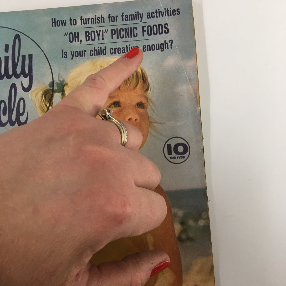 Close-up of the cover text from VTG Family Circle Magazine June 1961, which reads: 'How to furnish for family activities, OH, BOY! PICNIC FOODS, Is your child creative enough?'