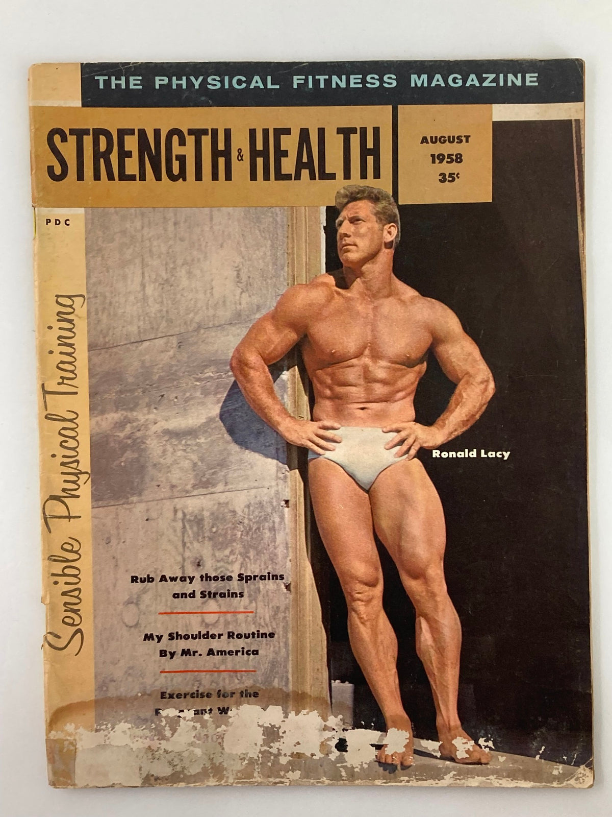 VTG Strength & Health Magazine August 1958 featuring Ronald Lacy on the cover, showcasing vintage fitness culture.