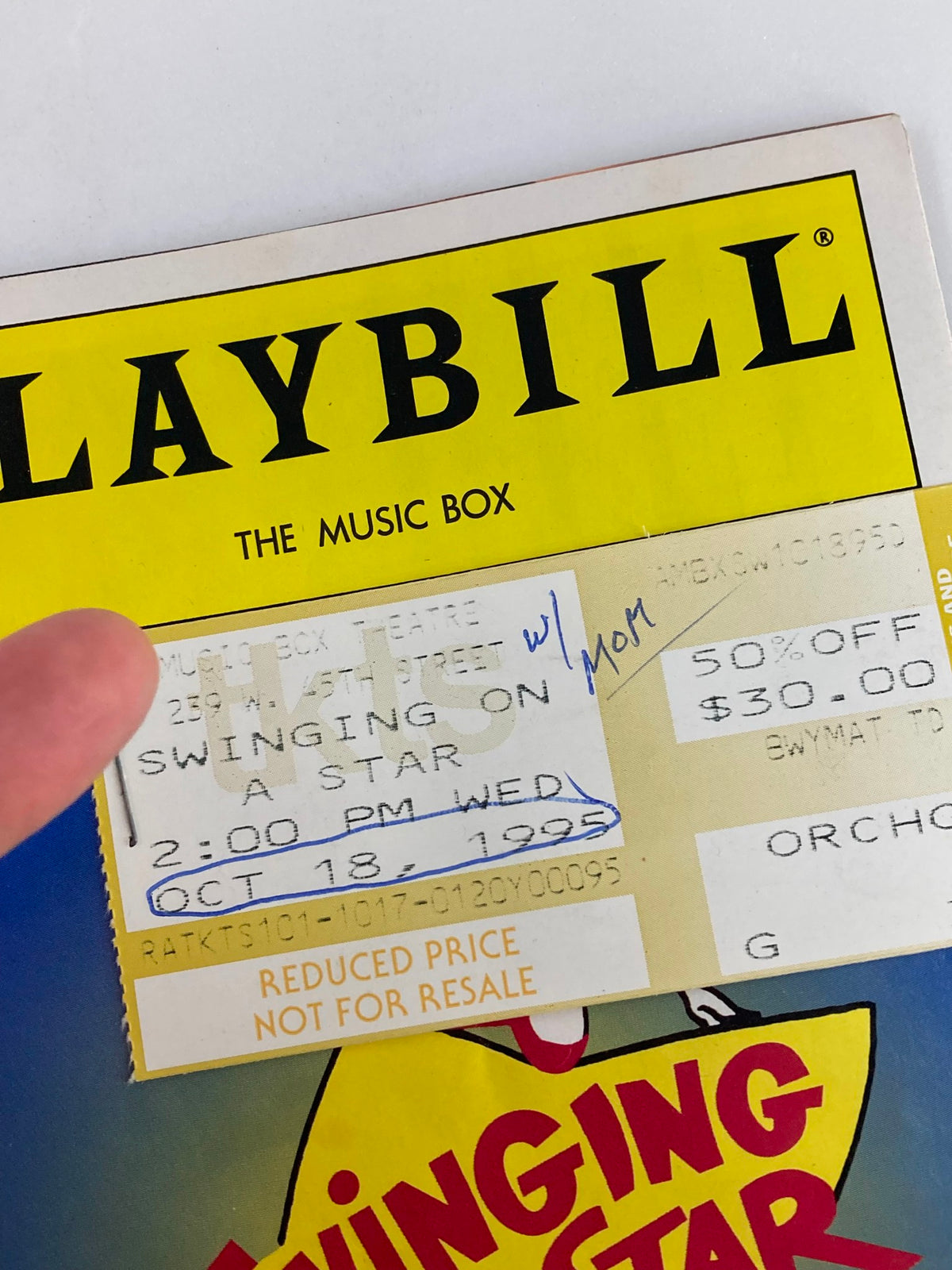 Close-up of 1995 Playbill The Music Box showing ticket details for Swinging On A Star performance on October 18, 1995